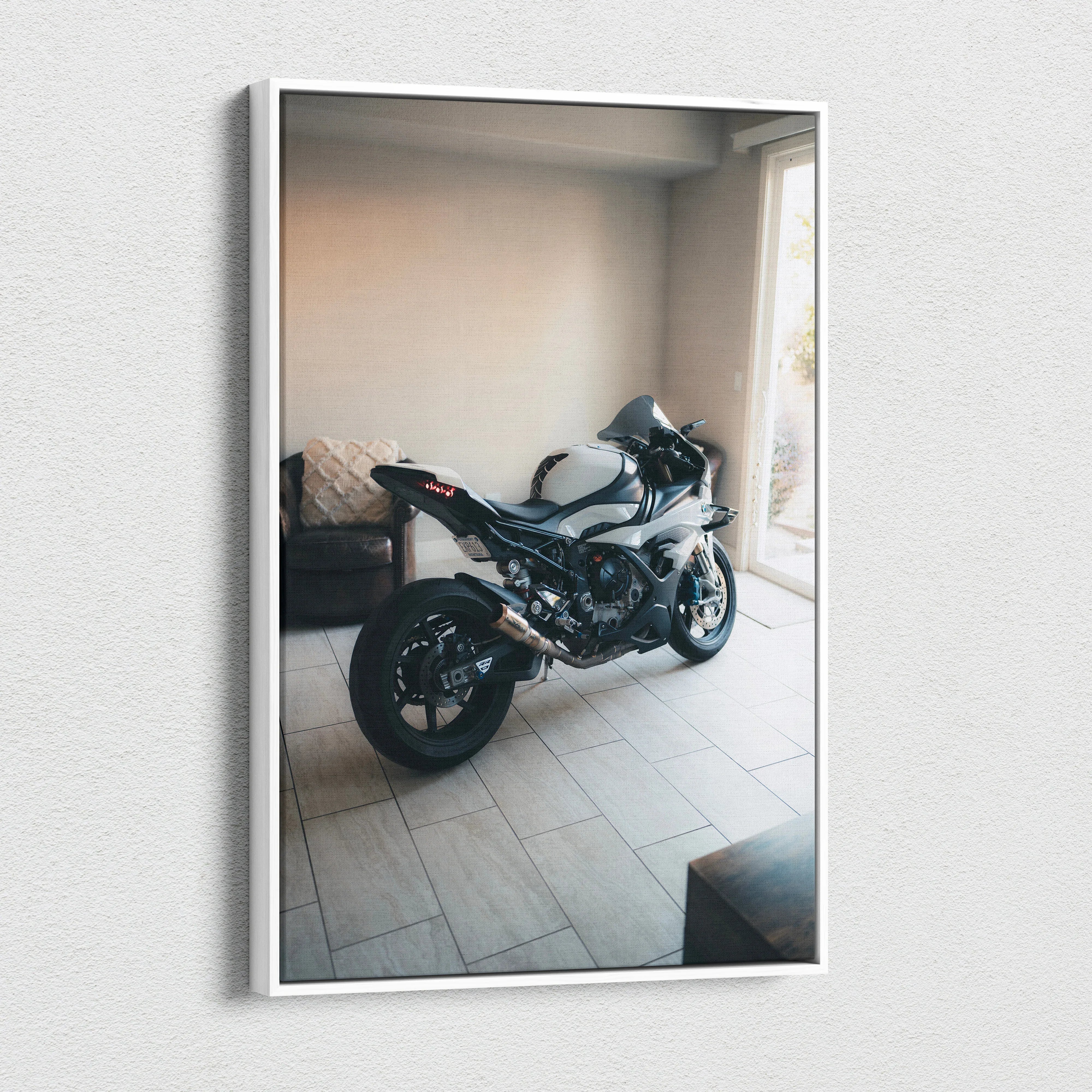 Vertical canvas wall art featuring a detailed BMW S1000RR motorcycle in a modern room setting.