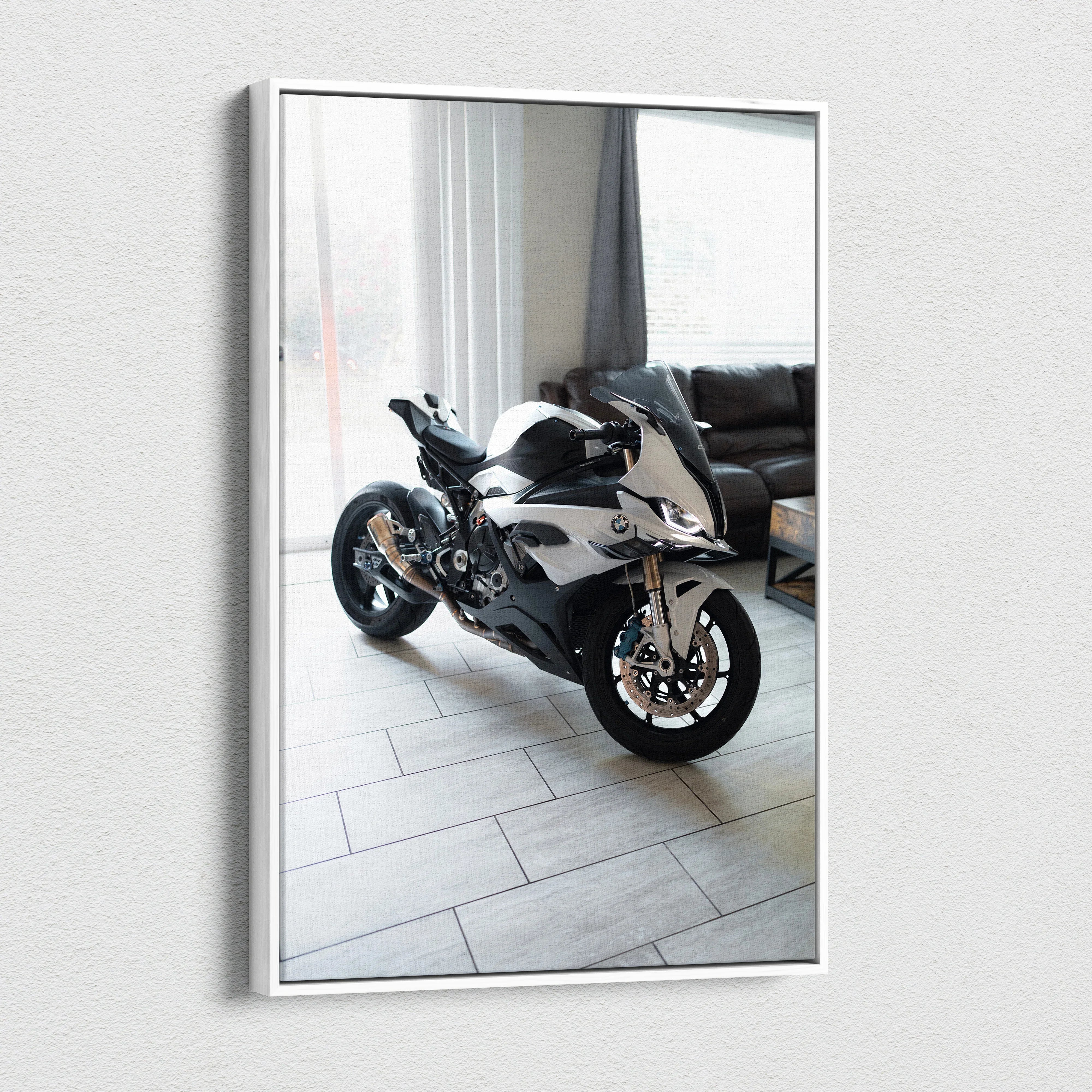 Vertical canvas wall art featuring a high-resolution BMW S1000RR motorcycle in a modern living room setting.