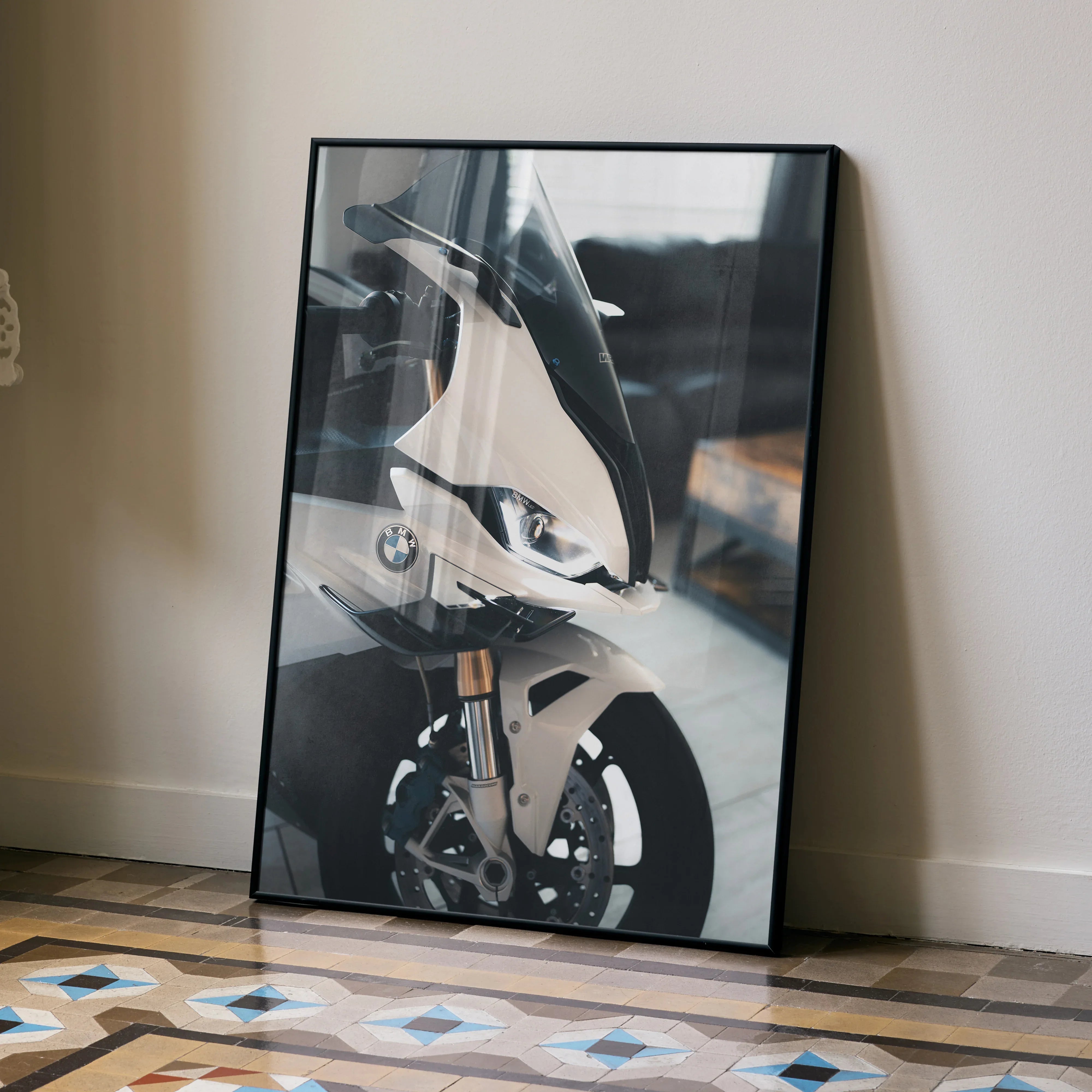 BMW S1000RR motorcycle poster wall art featuring close-up of front wheel and fairing in black frame.