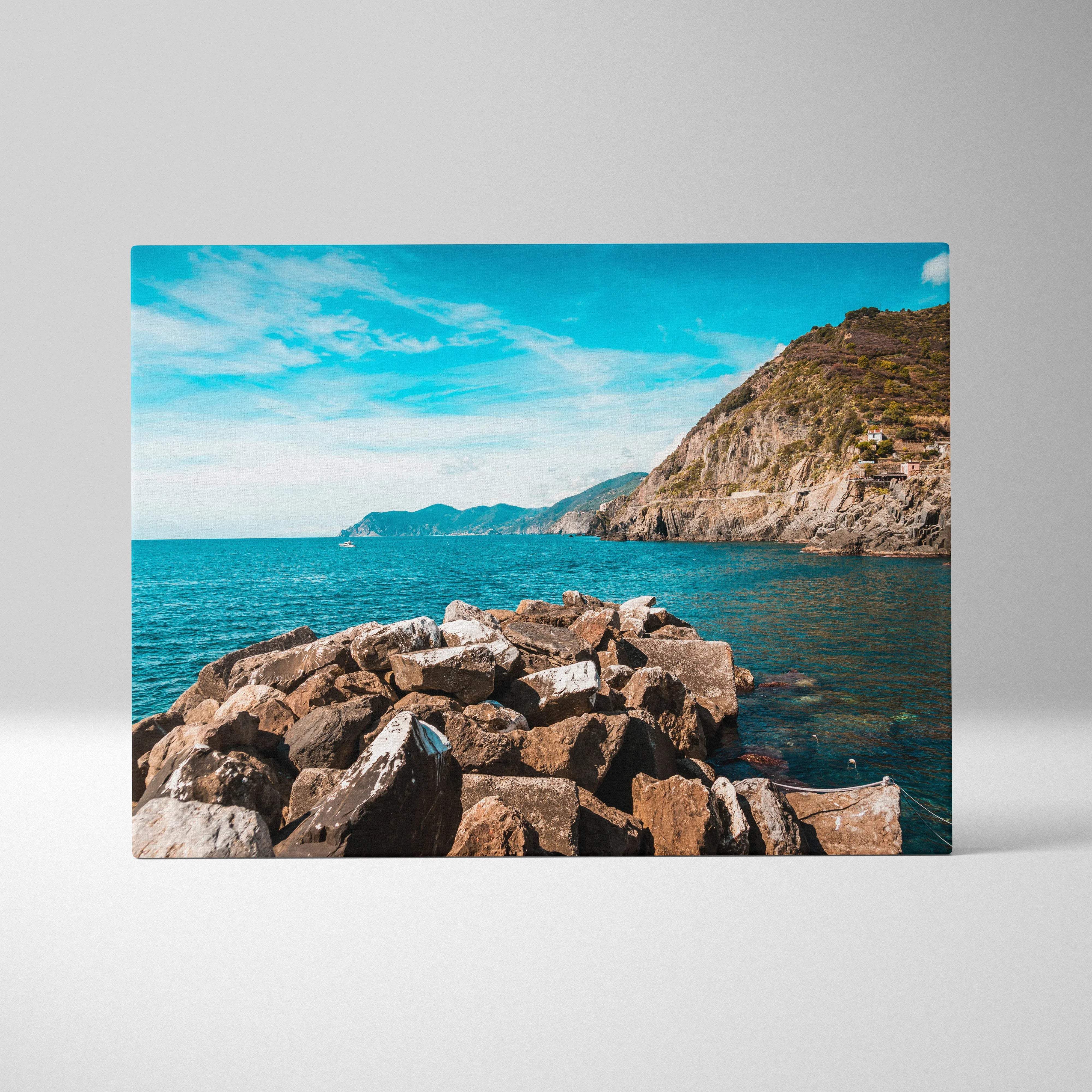 Vibrant rocky coastline near Riomaggiore canvas print with turquoise sea