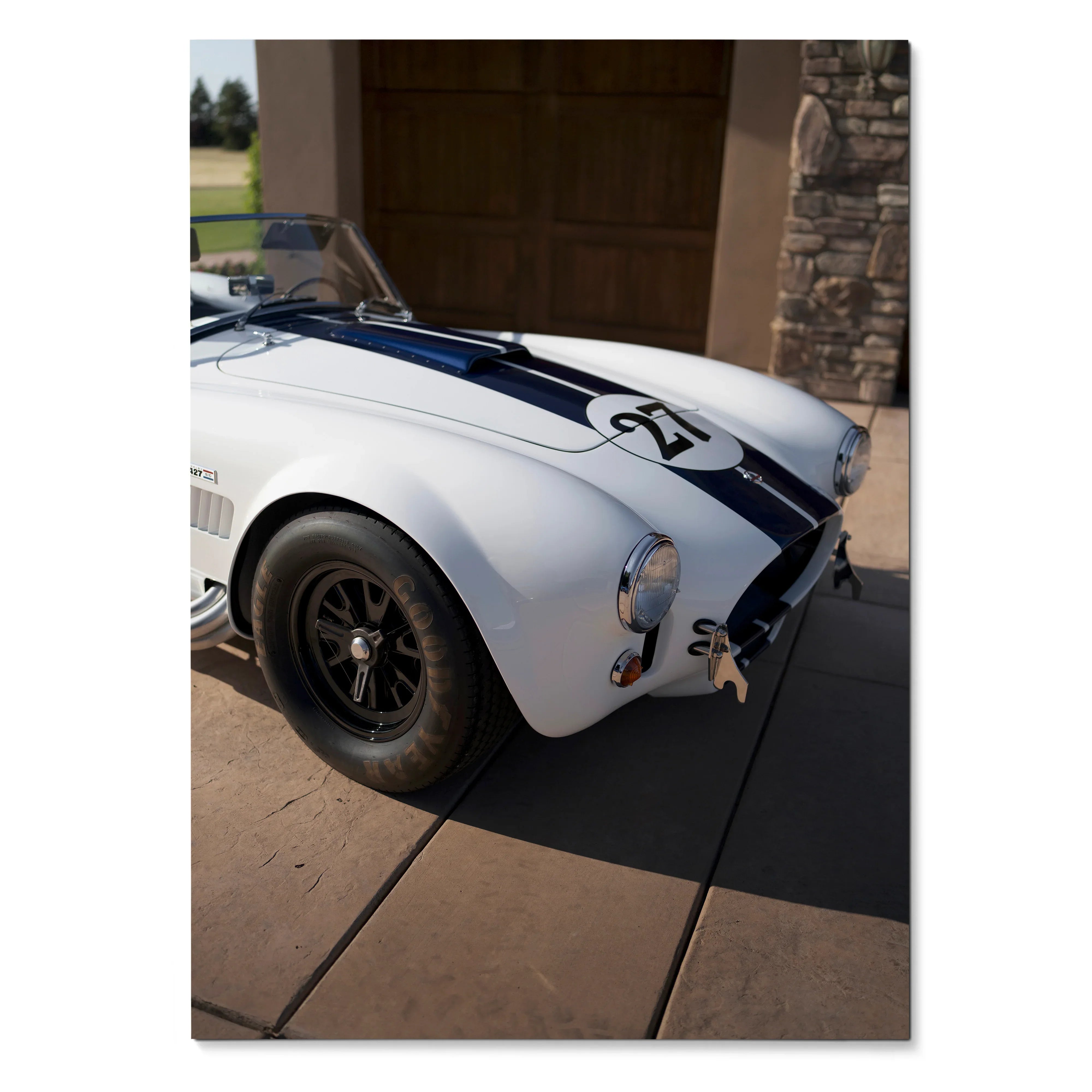 Shelby Cobra car close-up poster showing white body with black racing stripes and number 22, wall art.
