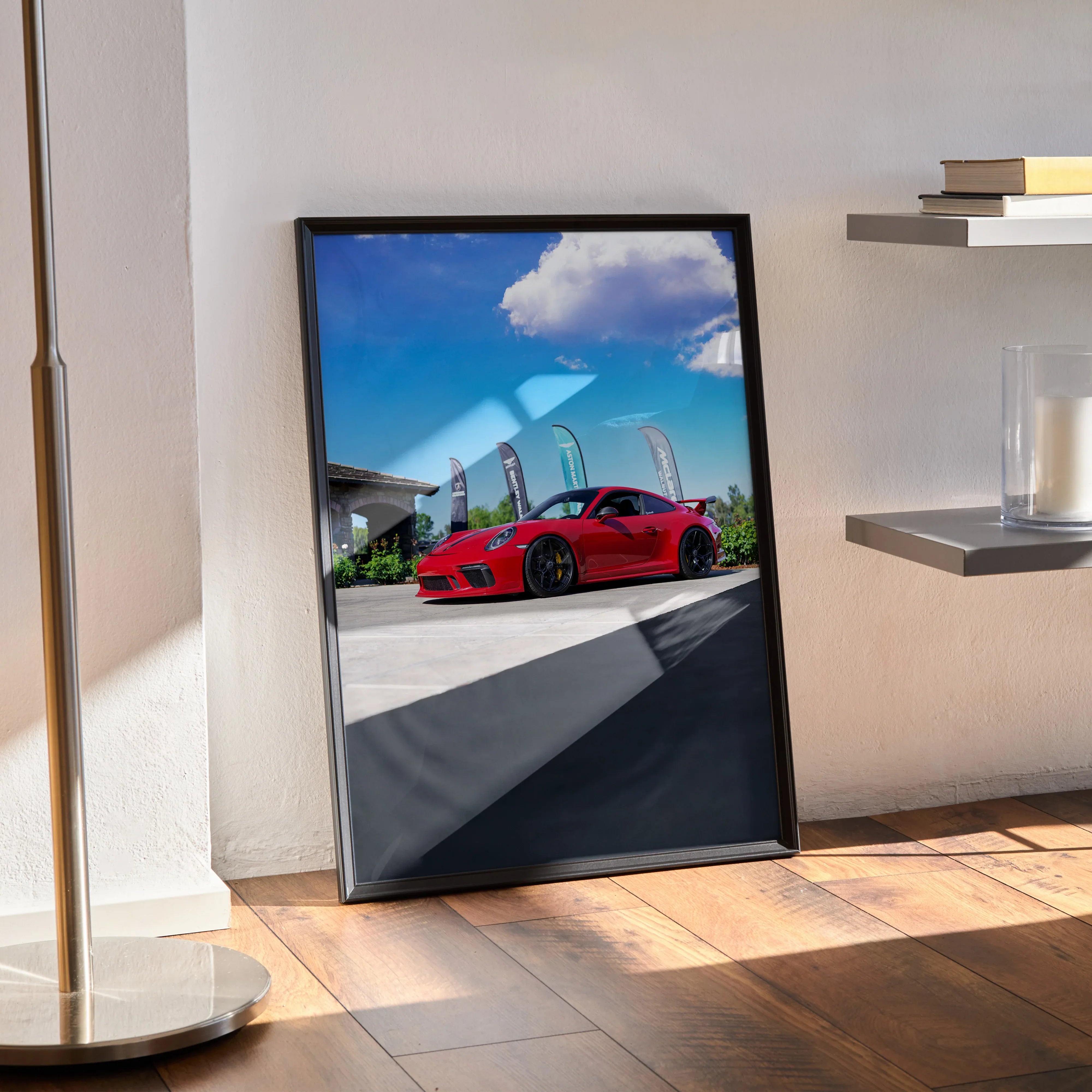 Red Porsche 911 GT3 parked outdoors under blue sky, sleek design poster wall art in black frame.