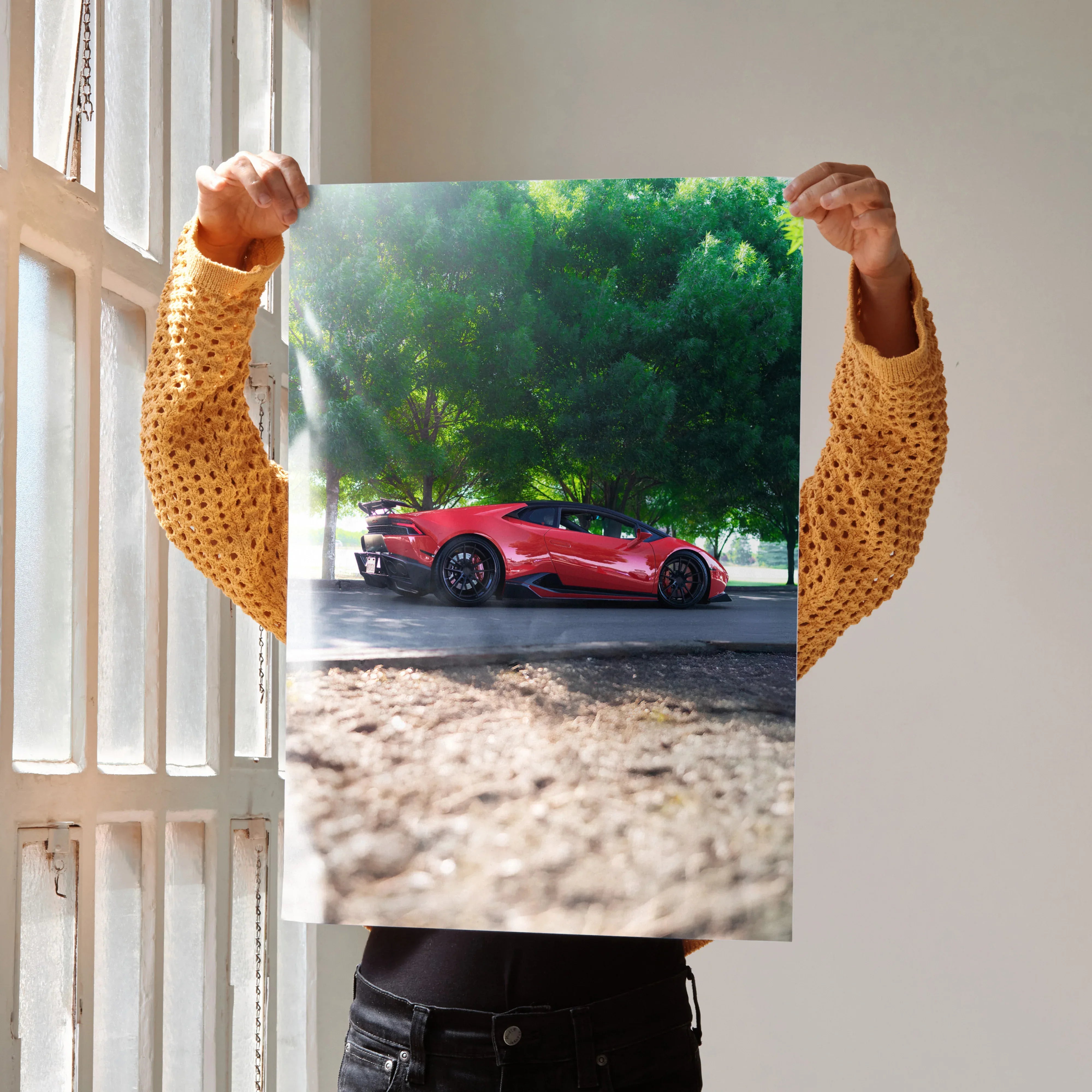 Lamborghini Huracan red sports car poster with lush green trees background wall art.