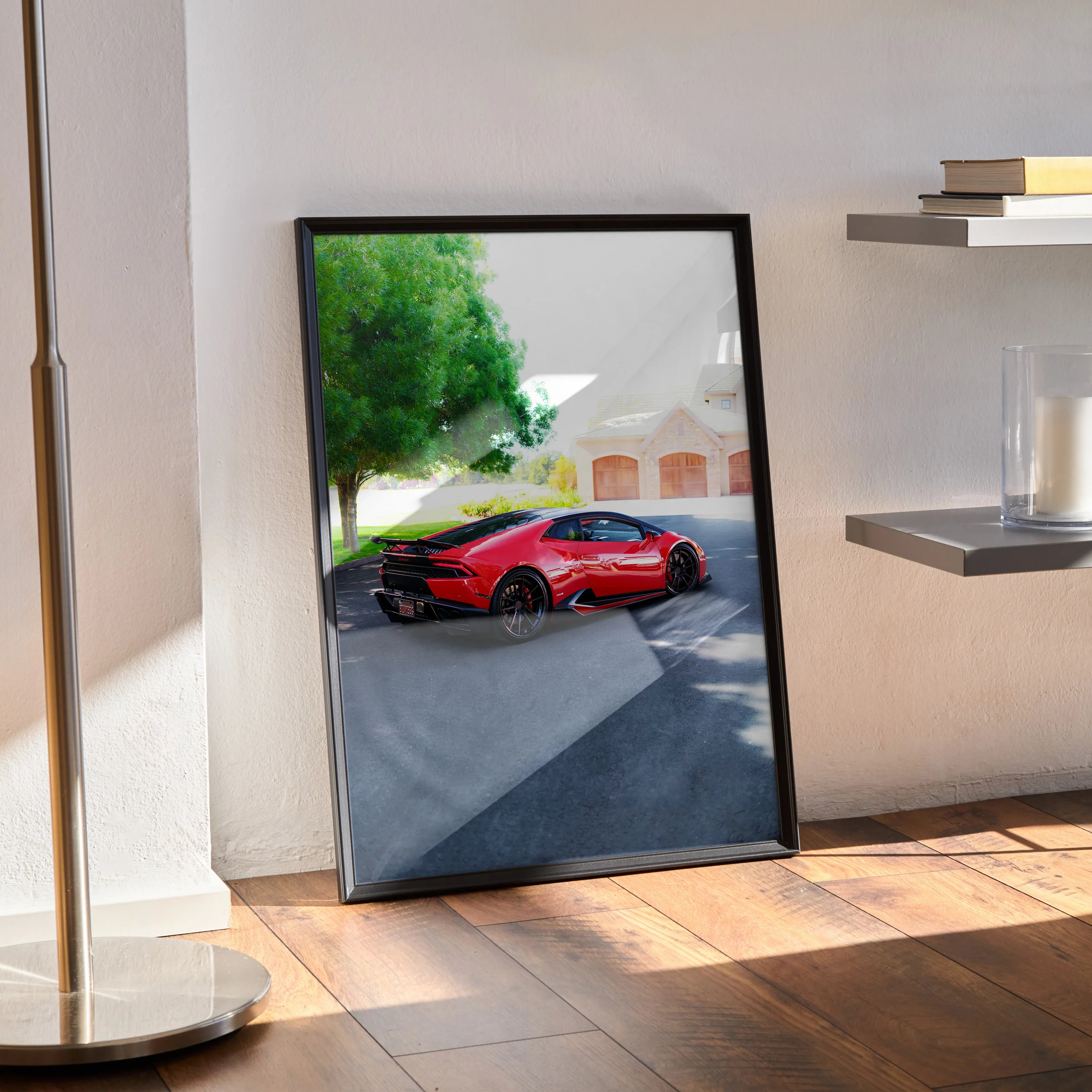 Lamborghini Huracan red sports car poster framed as stylish wall art leaning against neutral wall on wooden floor.
