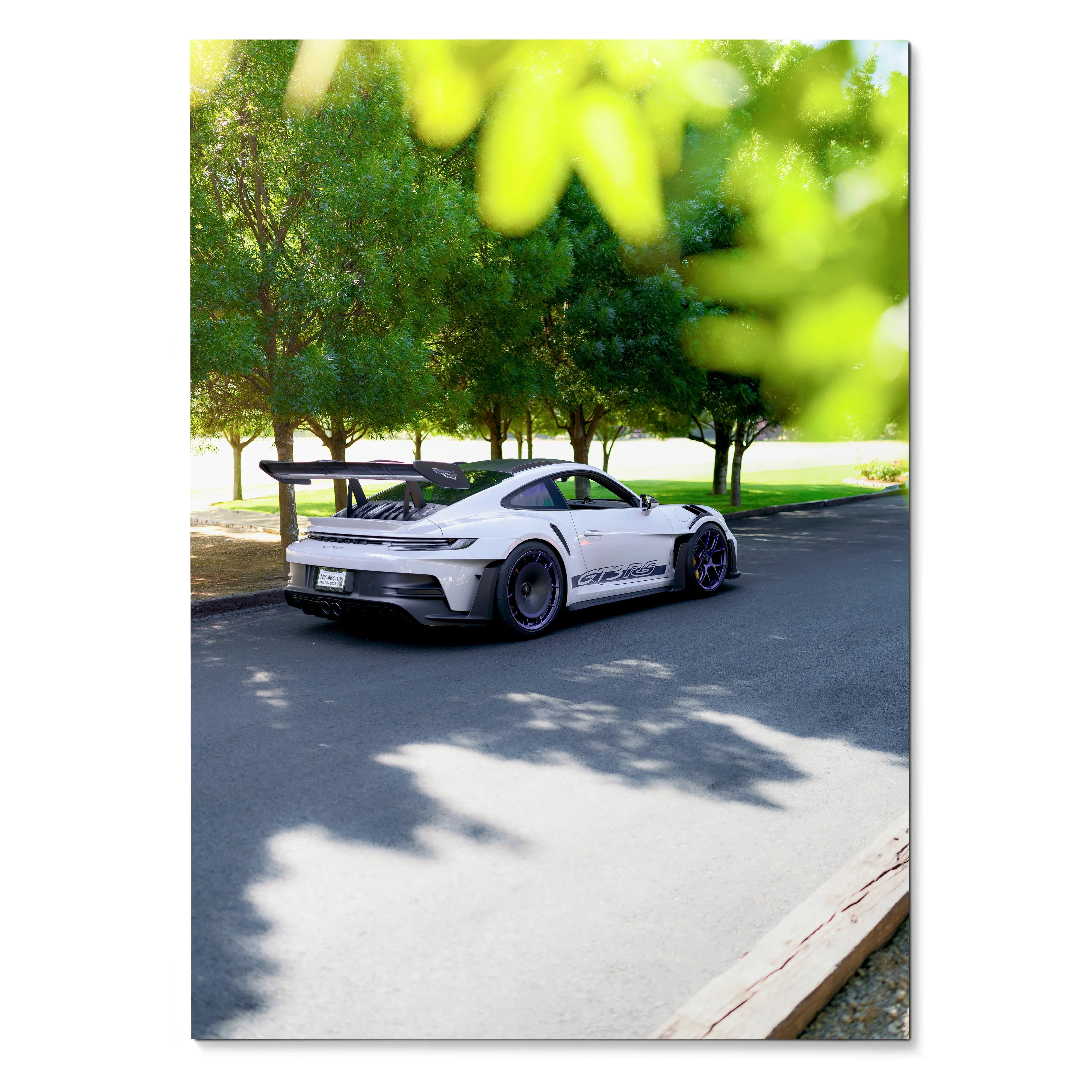 Porsche 911 GT3 RS white sports car parked under green trees poster wall art.