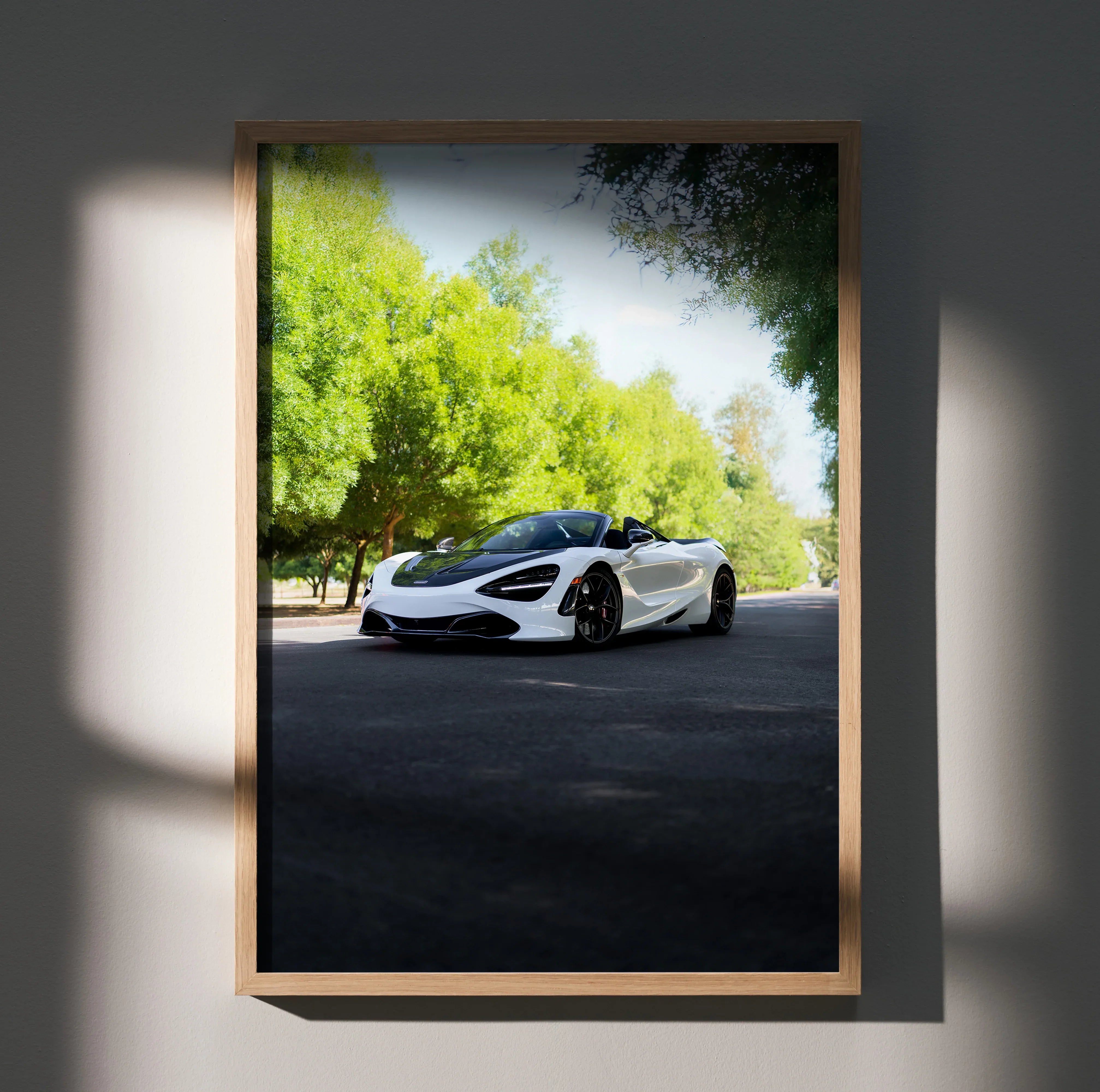 McLaren 720S white sports car on road with trees background poster wall art.