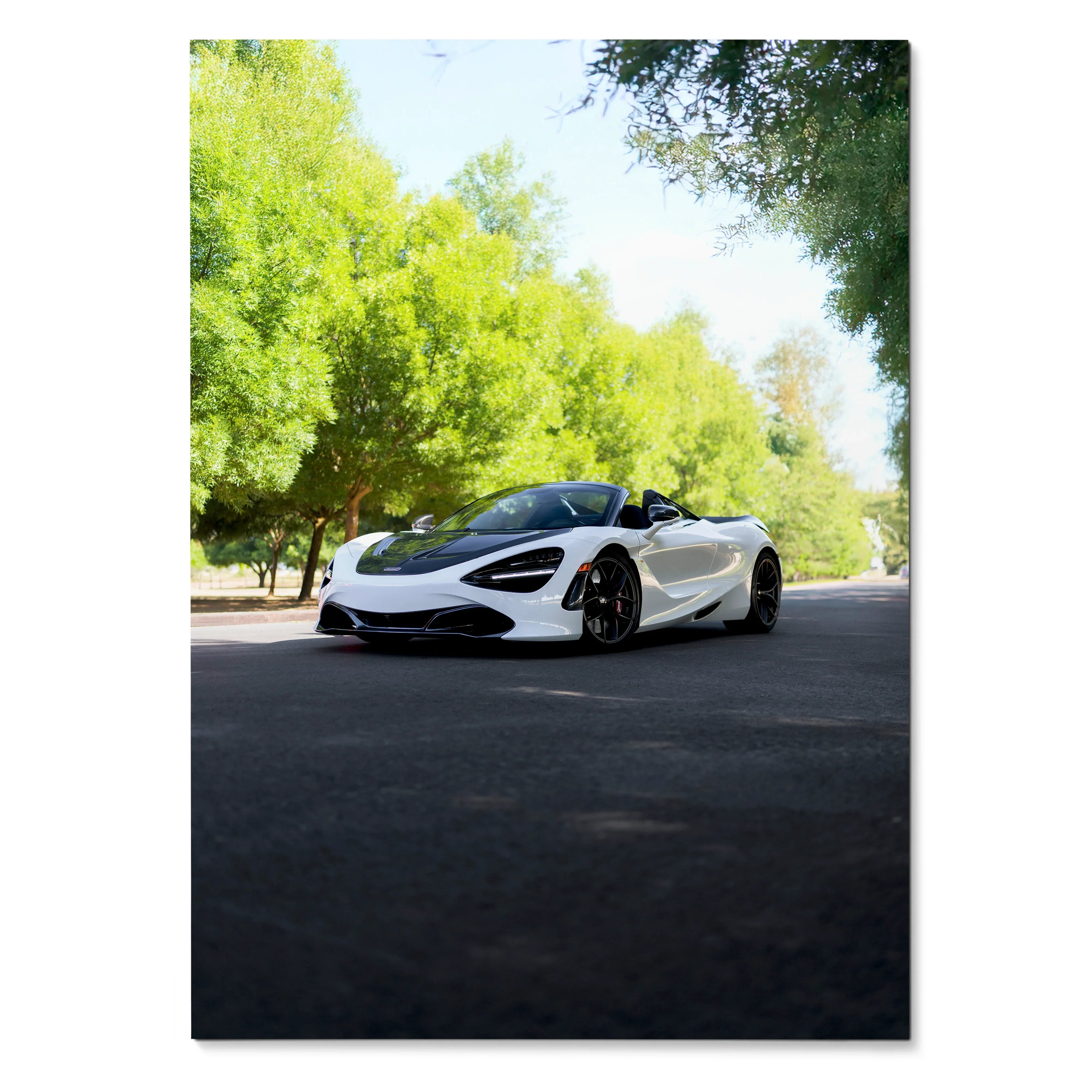 McLaren 720S white sports car driving on sunlit road poster wall art.