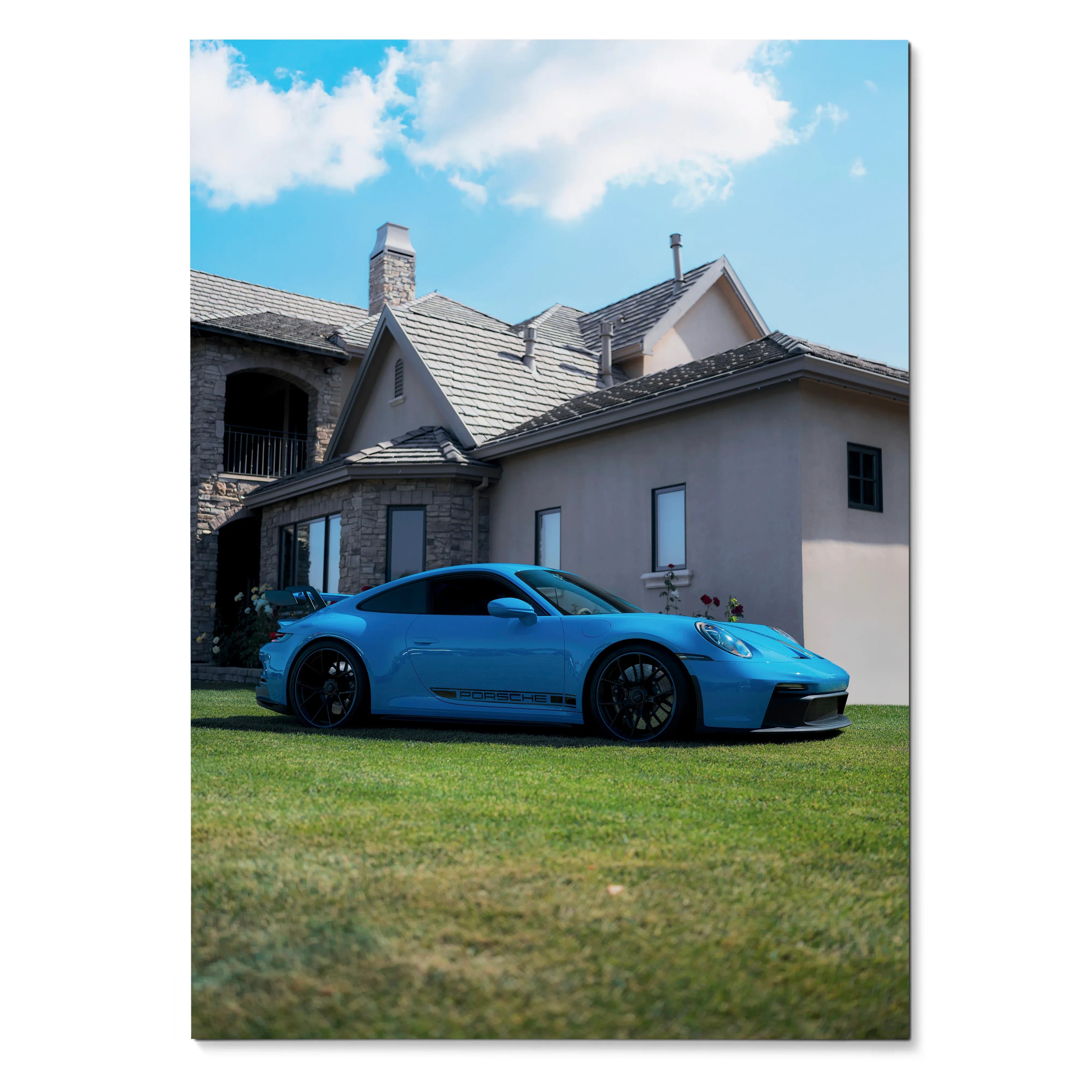Blue Porsche 911 GT3 parked on grass in front of suburban house poster wall art.