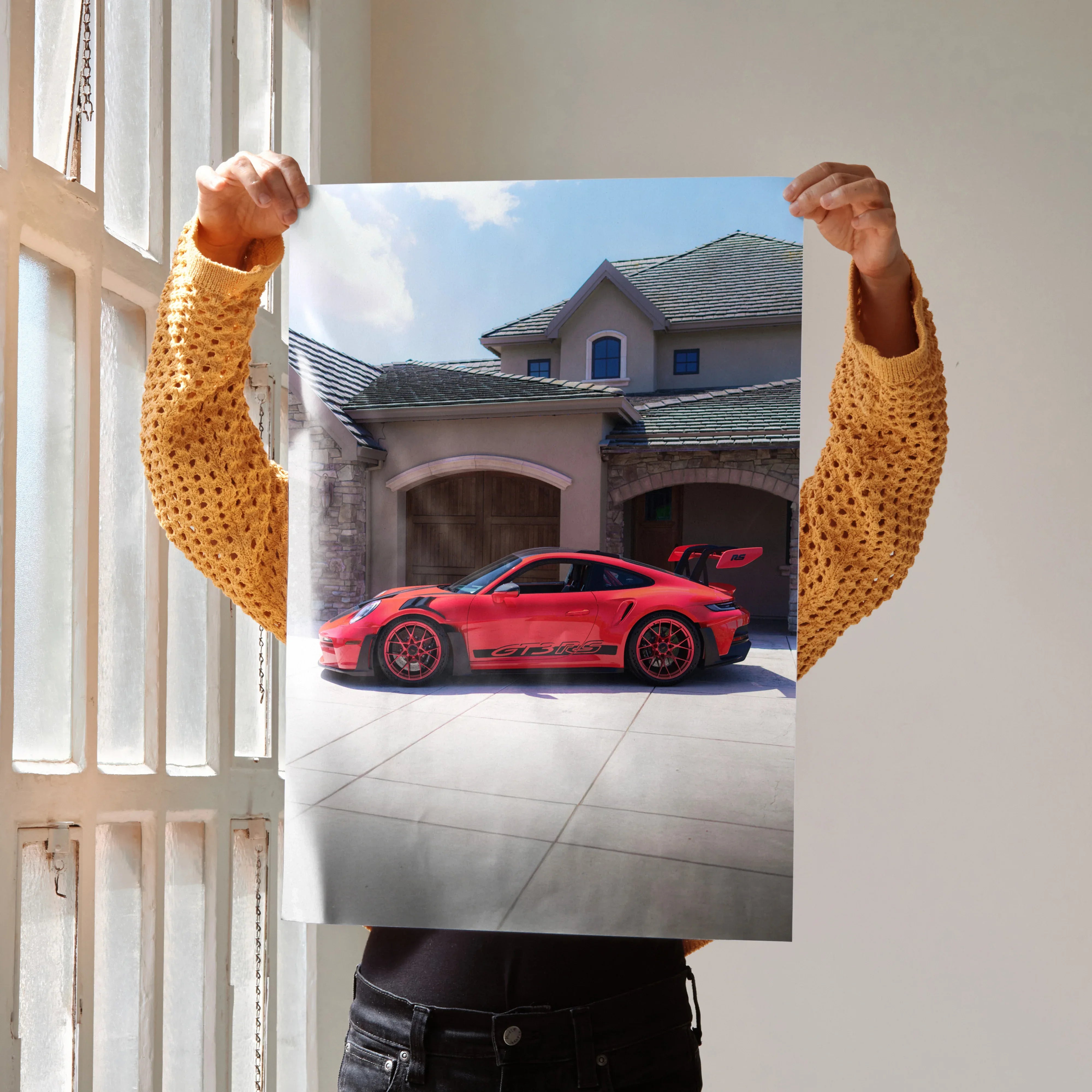 Poster of a red Porsche 911 GT3 RS parked in front of a modern house, vibrant wall art.