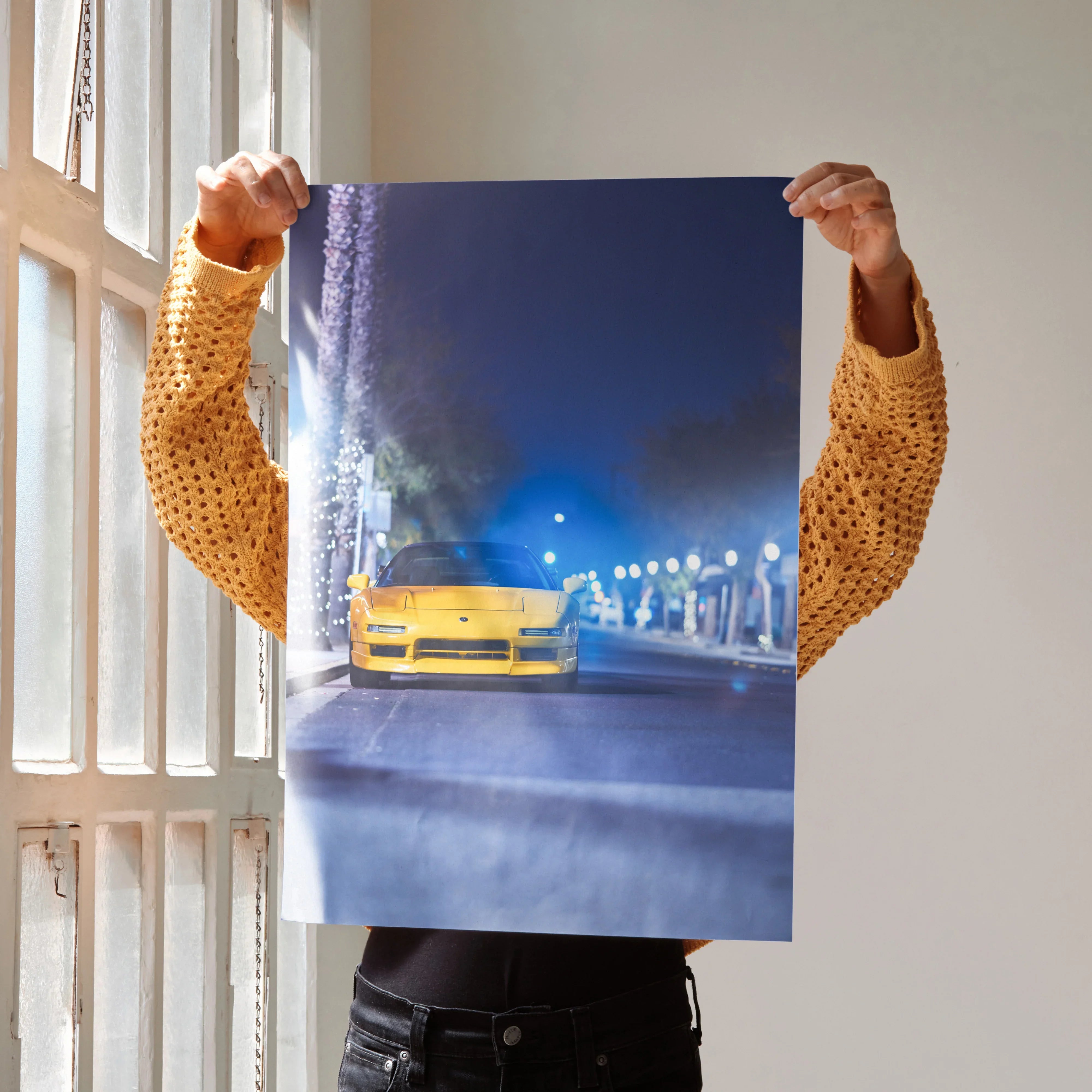 High-resolution Acura NSX poster wall art featuring a yellow sports car at night with city lights.