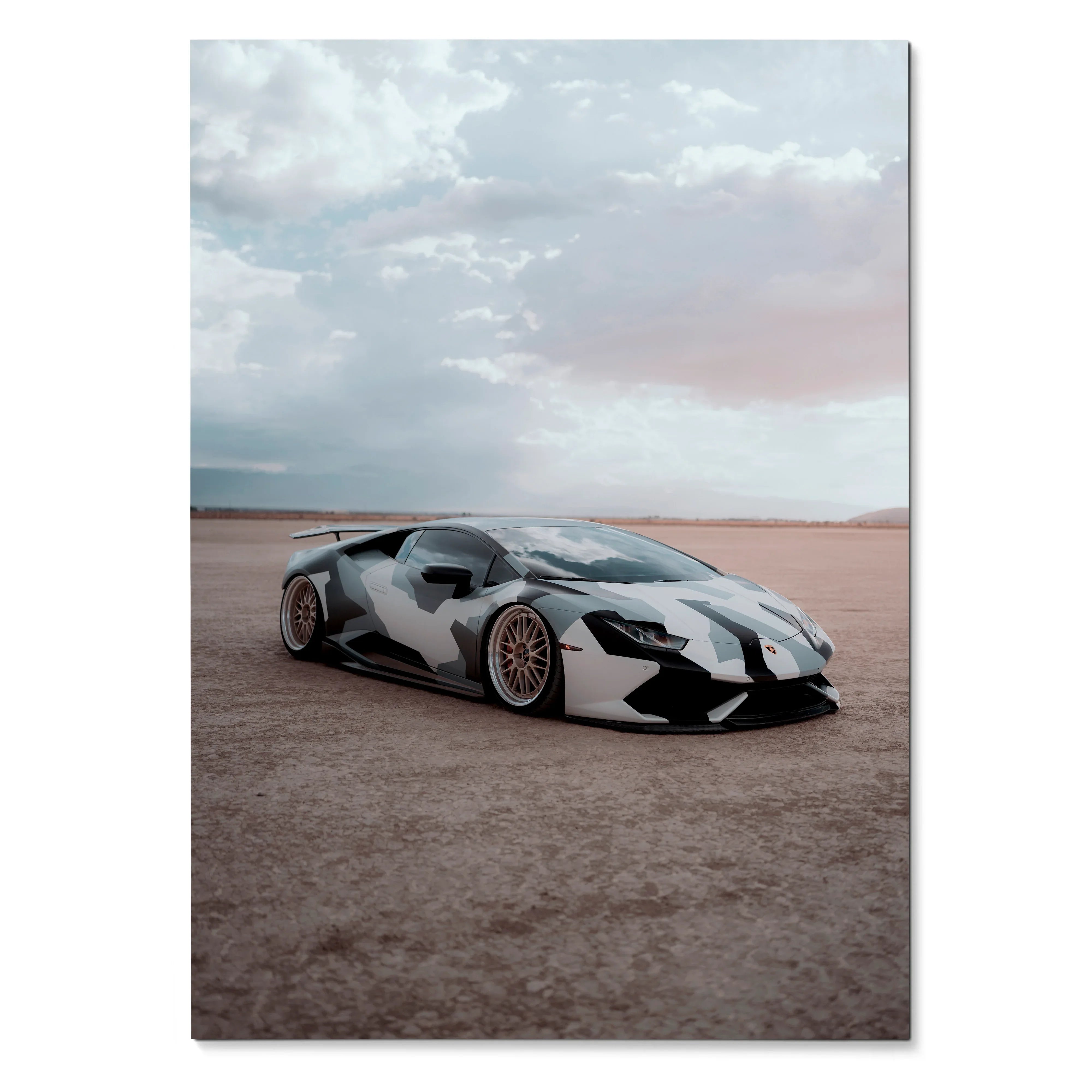 Lamborghini Huracan on desert road under cloudy sky poster wall art.