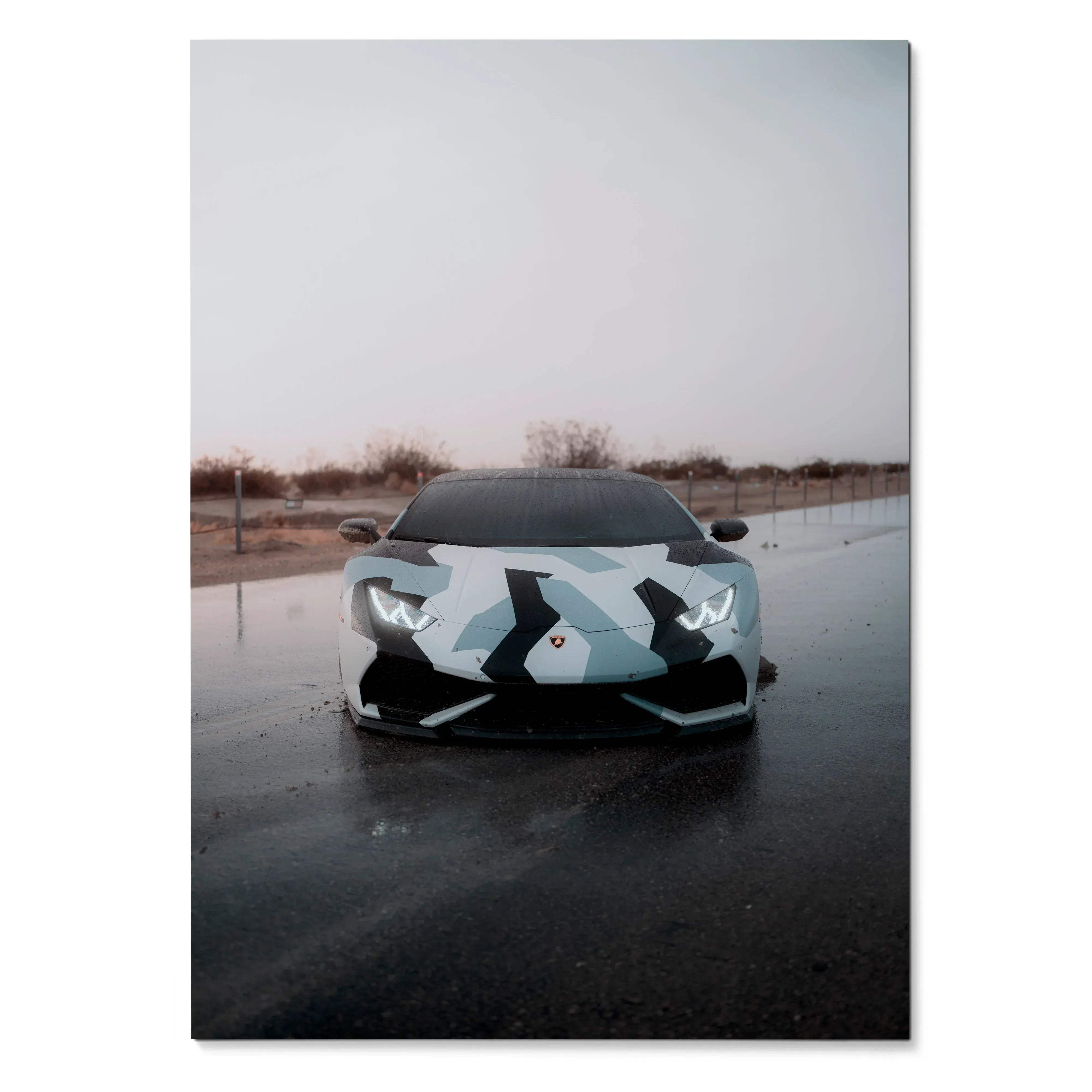 Lamborghini Huracan with geometric camouflage design on wet road poster wall art.