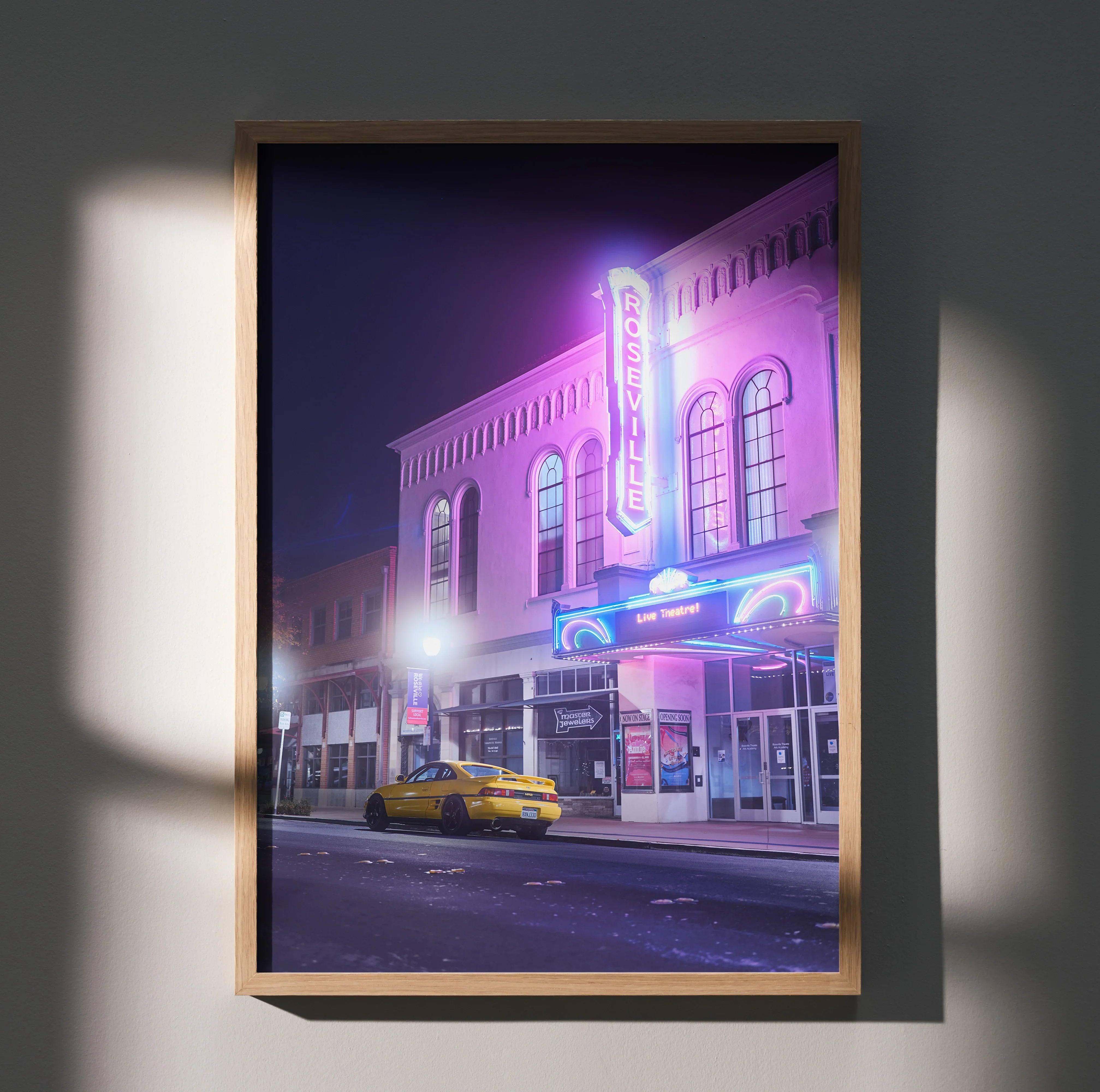 Toyota MR2 yellow sports car parked under neon lights, high-resolution poster wall art.