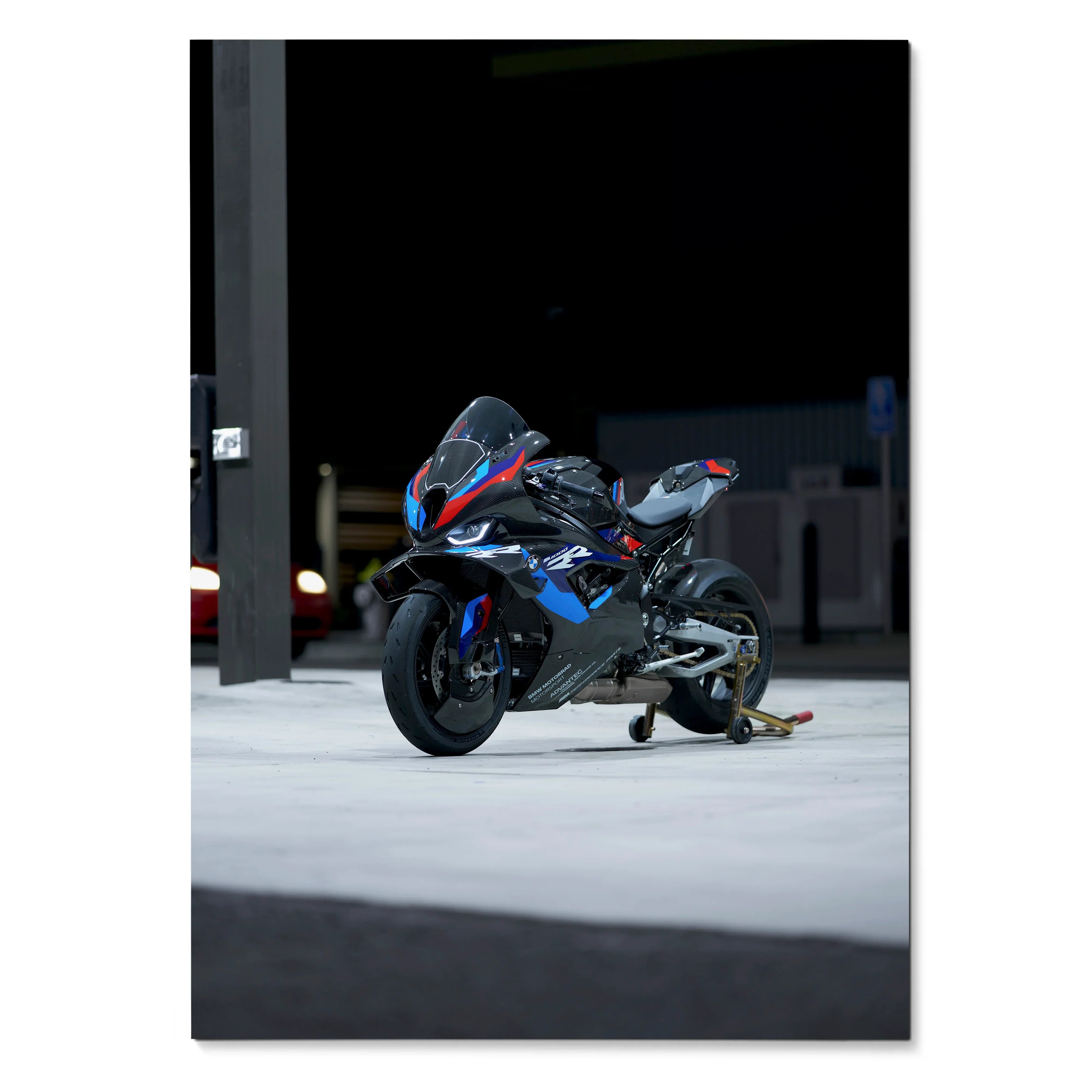BMW M1000RR motorcycle sleek black and blue poster wall art with sporty design and elegant details.
