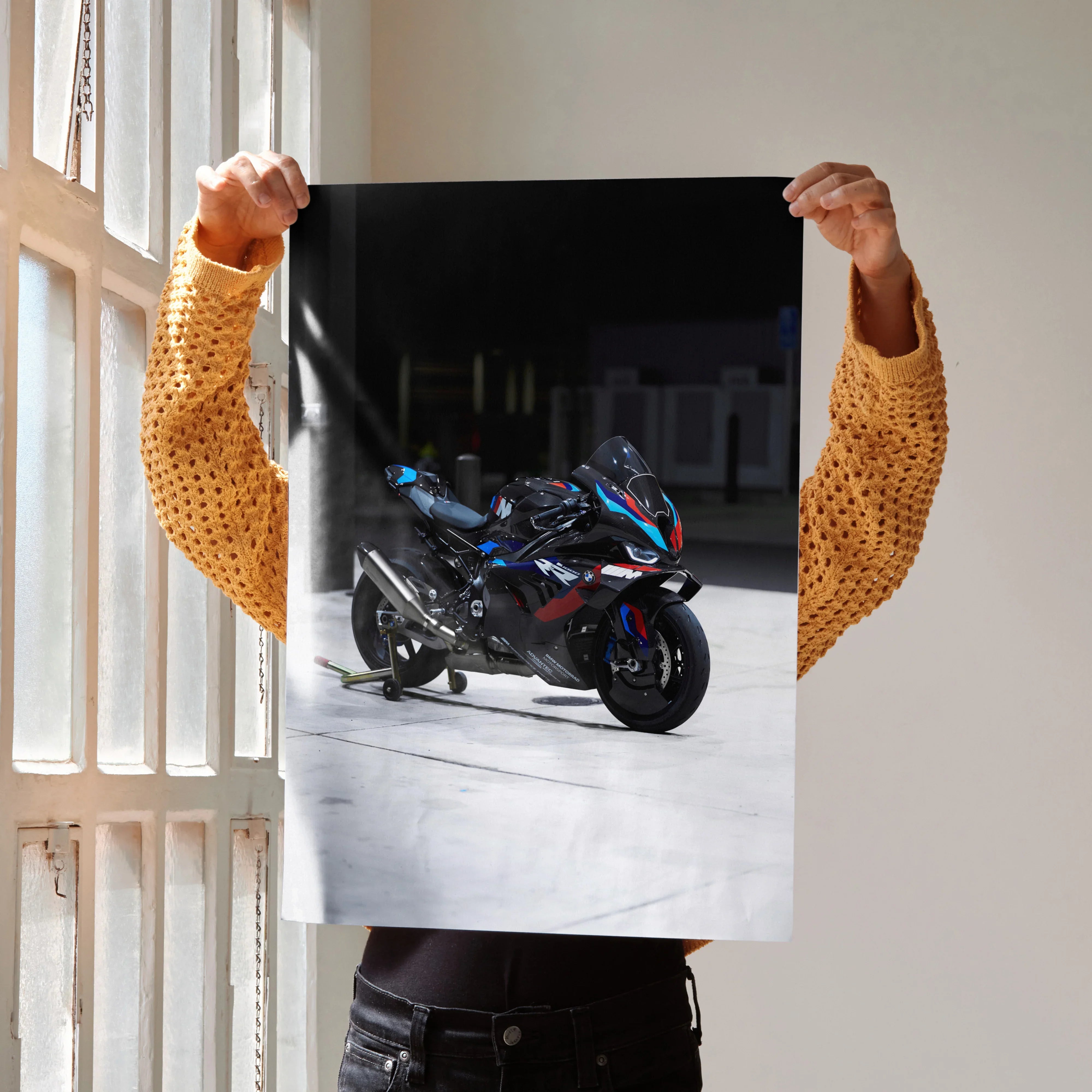 BMW M1000RR motorcycle poster showcasing sleek black and blue superbike as wall art print.
