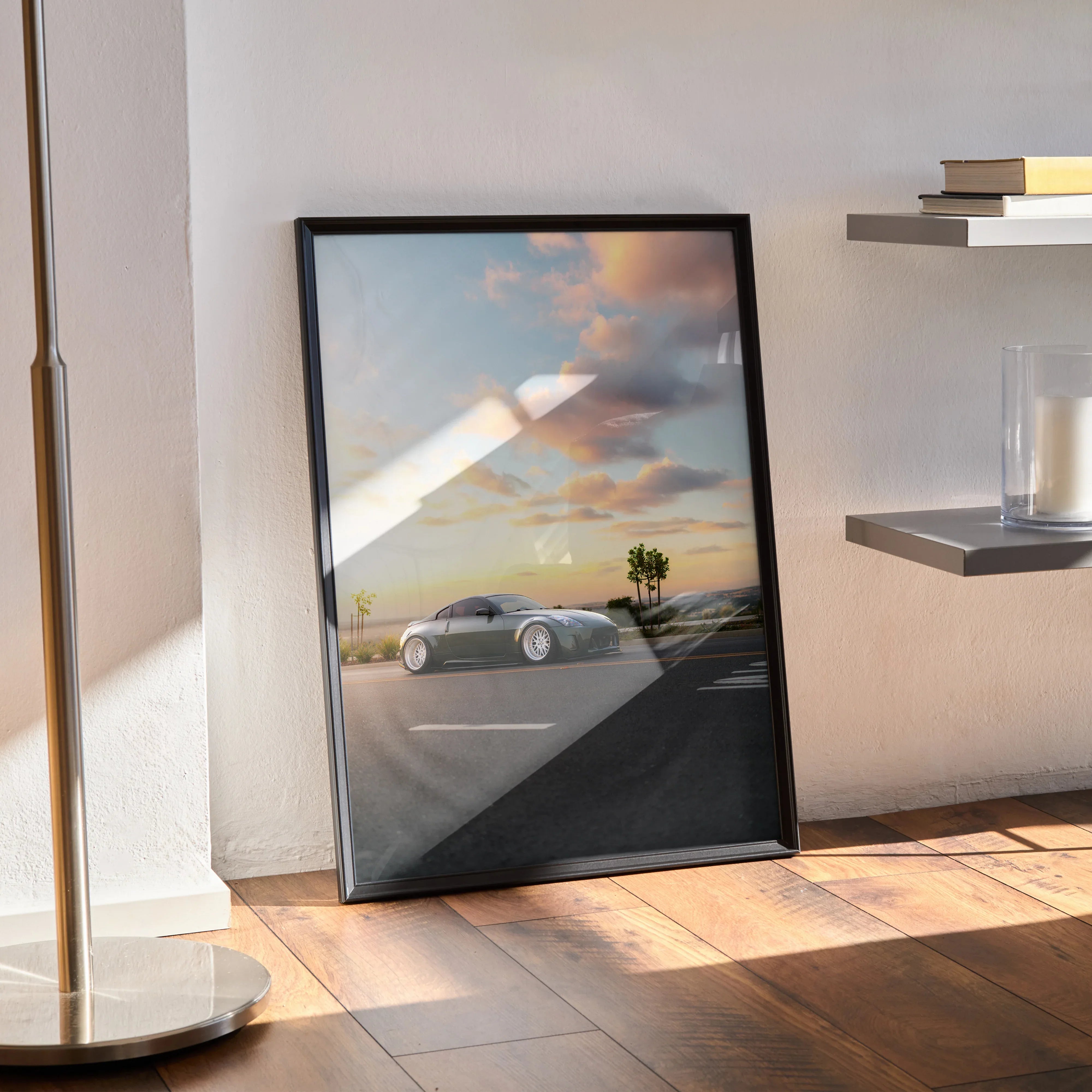 Nissan 350z car poster with sunset sky, sleek silver sports car, modern wall art in black frame.