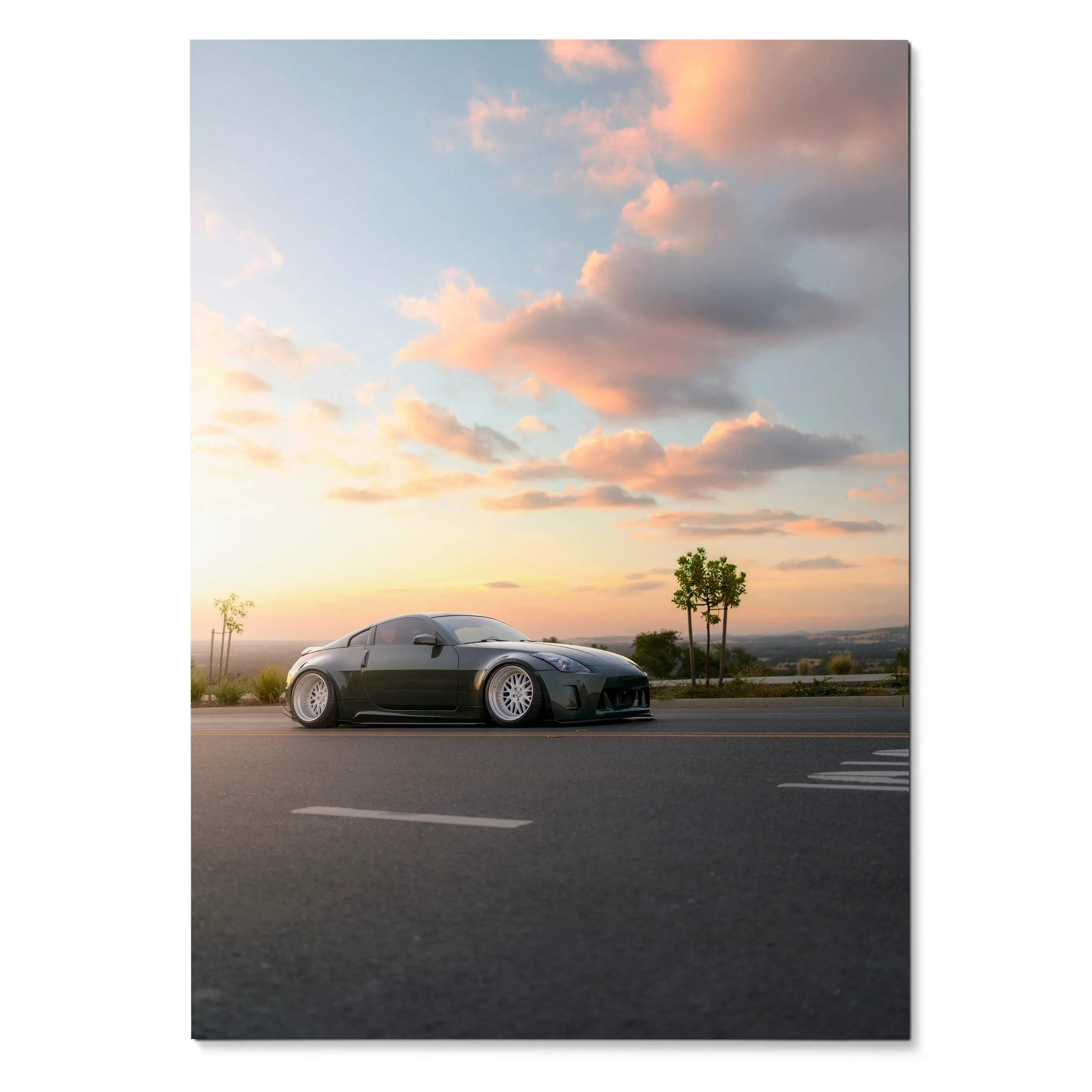 Nissan 350z on road at sunset with pink clouds poster wall art.