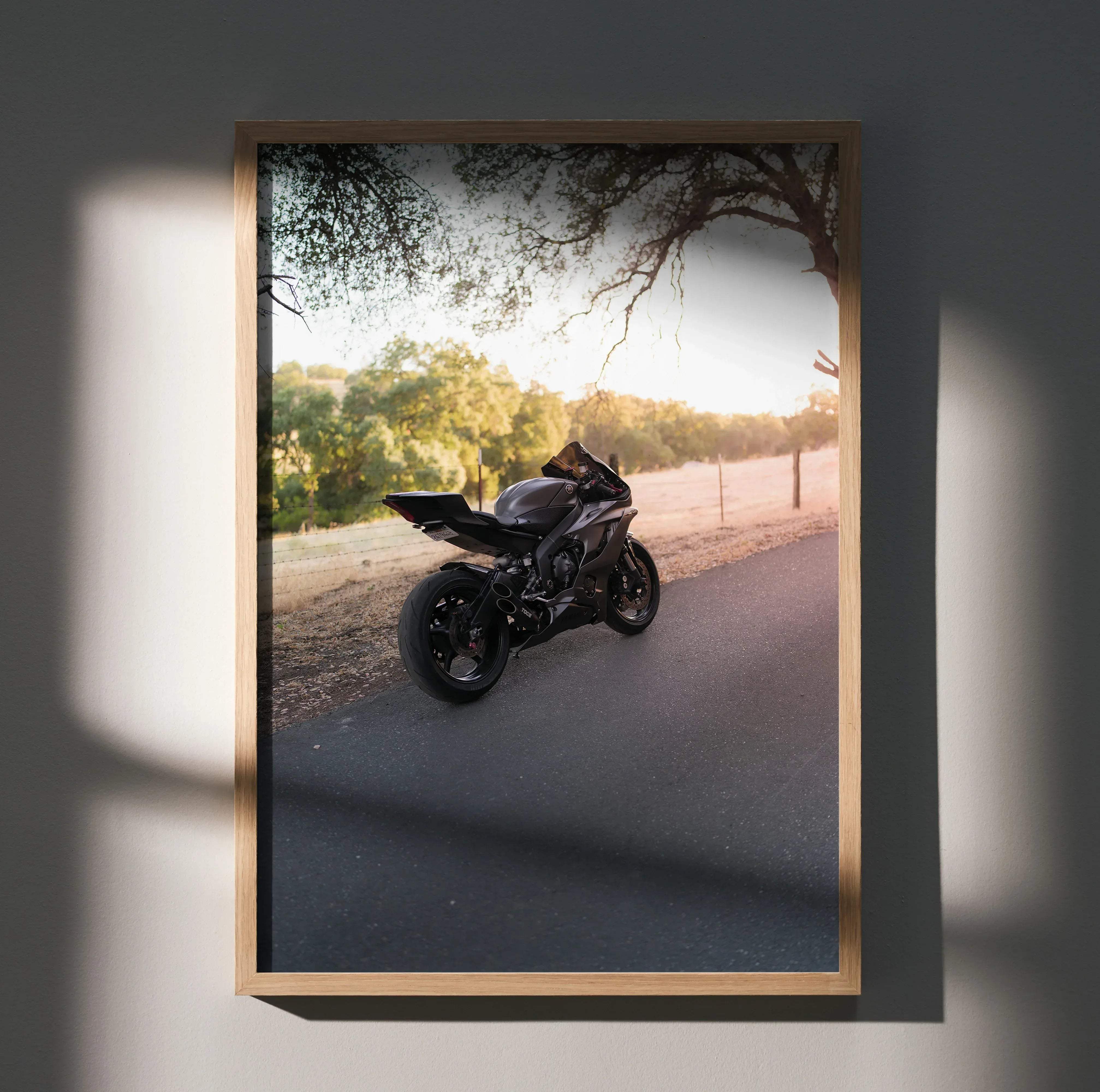 Black Yamaha R6 sport motorcycle poster framed in light wood for wall decor and motorcycle enthusiasts