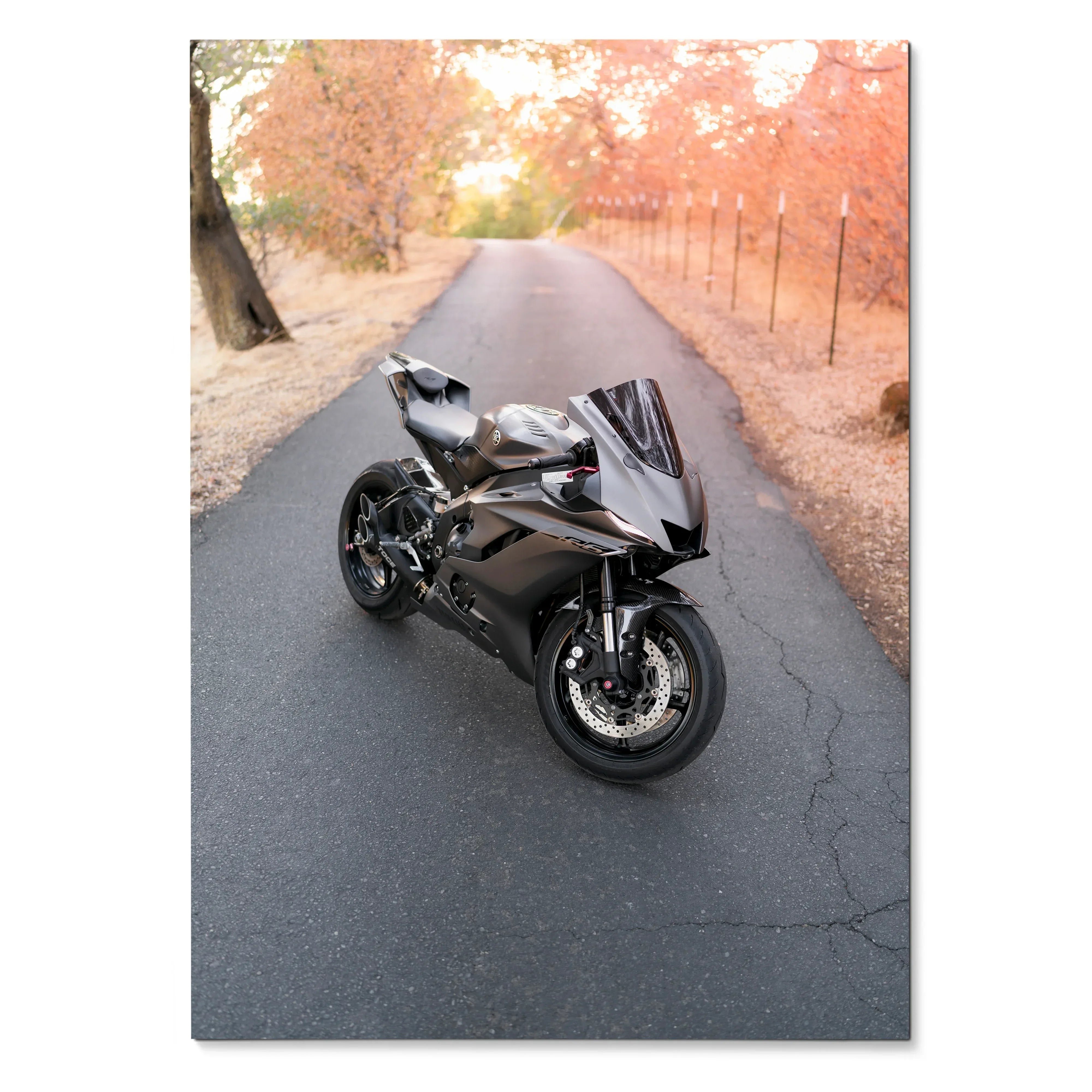 Black Yamaha R6 motorcycle on empty autumn road poster wall art.