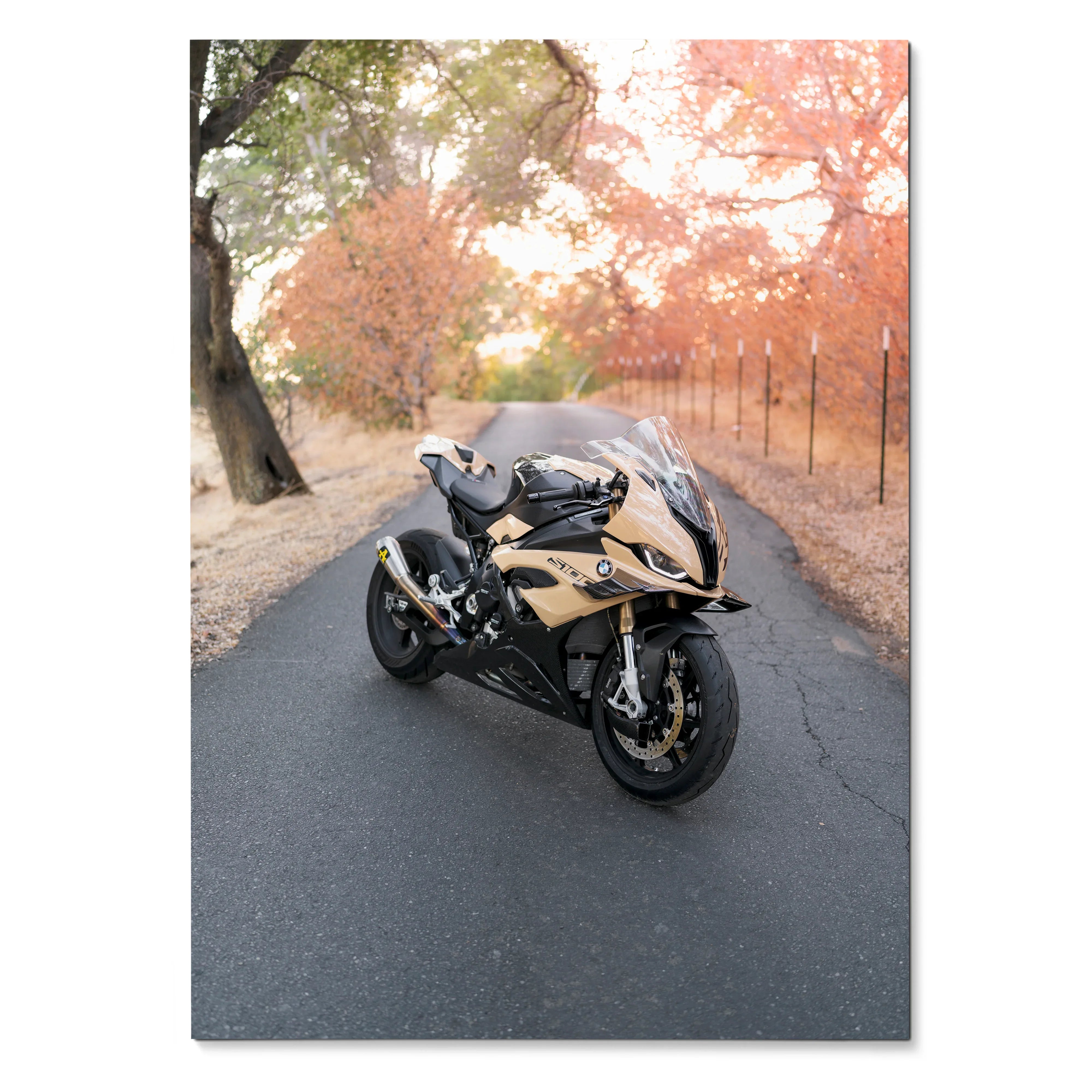 BMW S1000RR motorcycle on scenic autumn road poster wall art with warm fall colors.