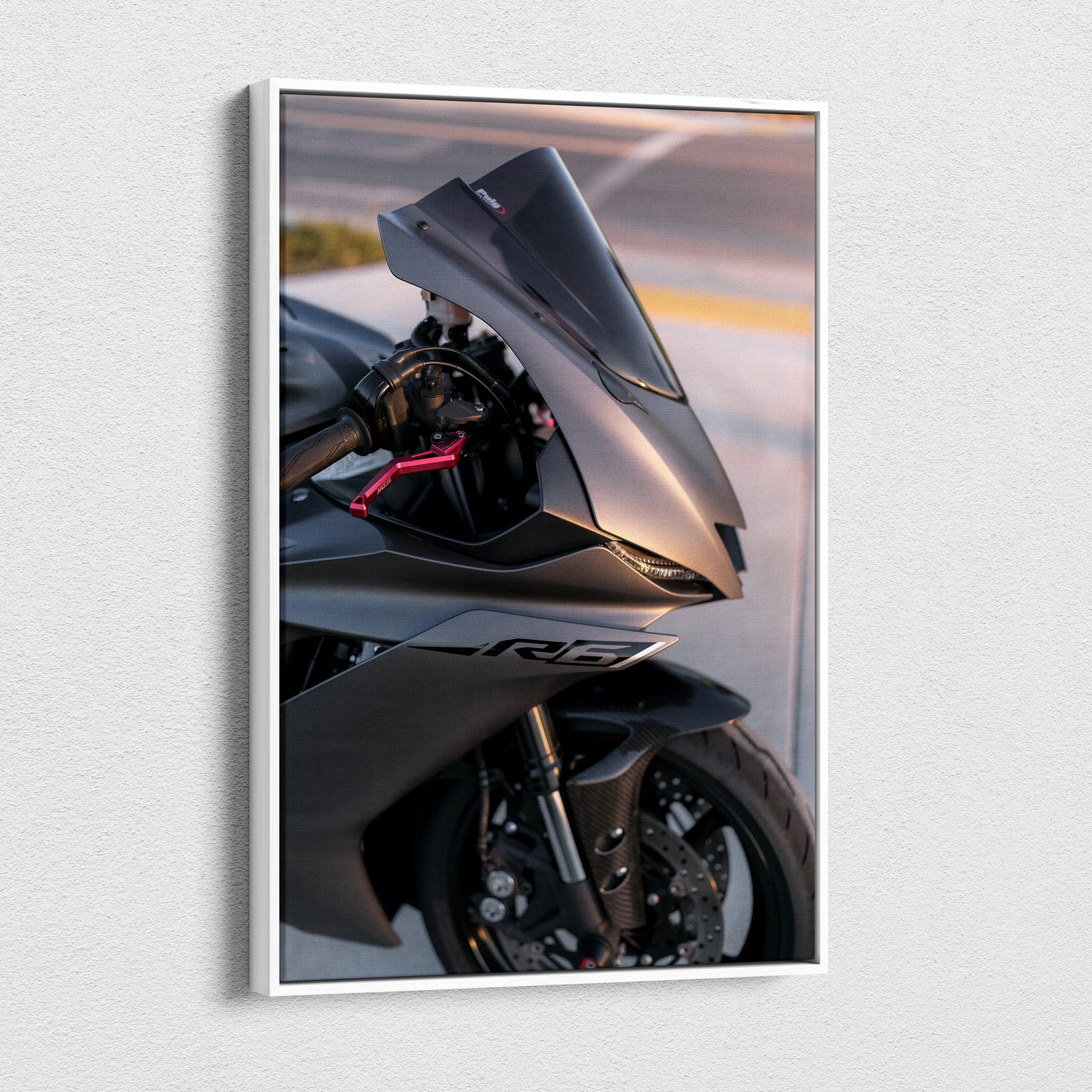 Yamaha R6 motorcycle close-up canvas art with sleek black fairing and detailed front wheel wall art.