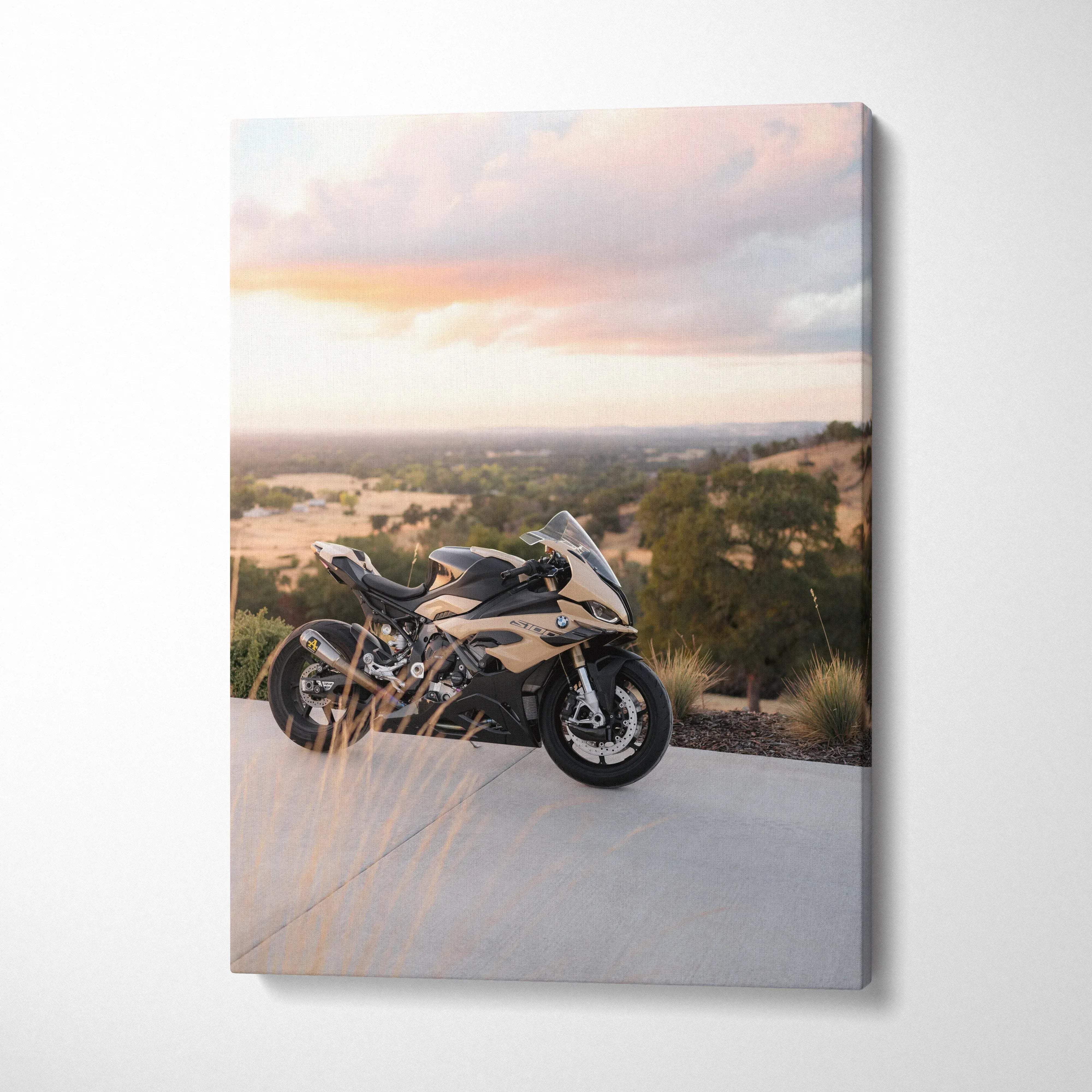 Vertical canvas wall art featuring a BMW S1000RR motorcycle against a sunset landscape background.