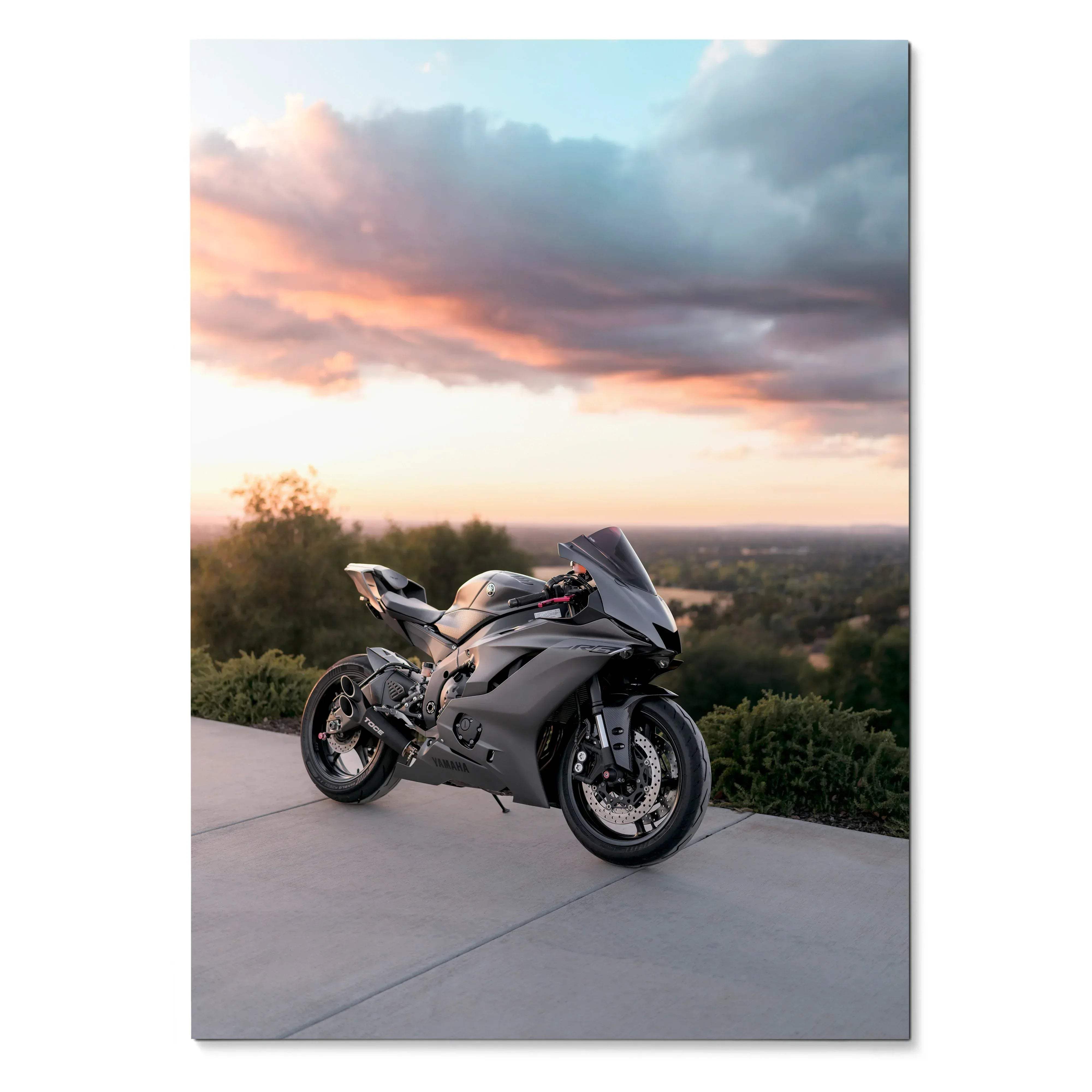 Yamaha R6 motorcycle parked on concrete against sunset sky poster wall art.