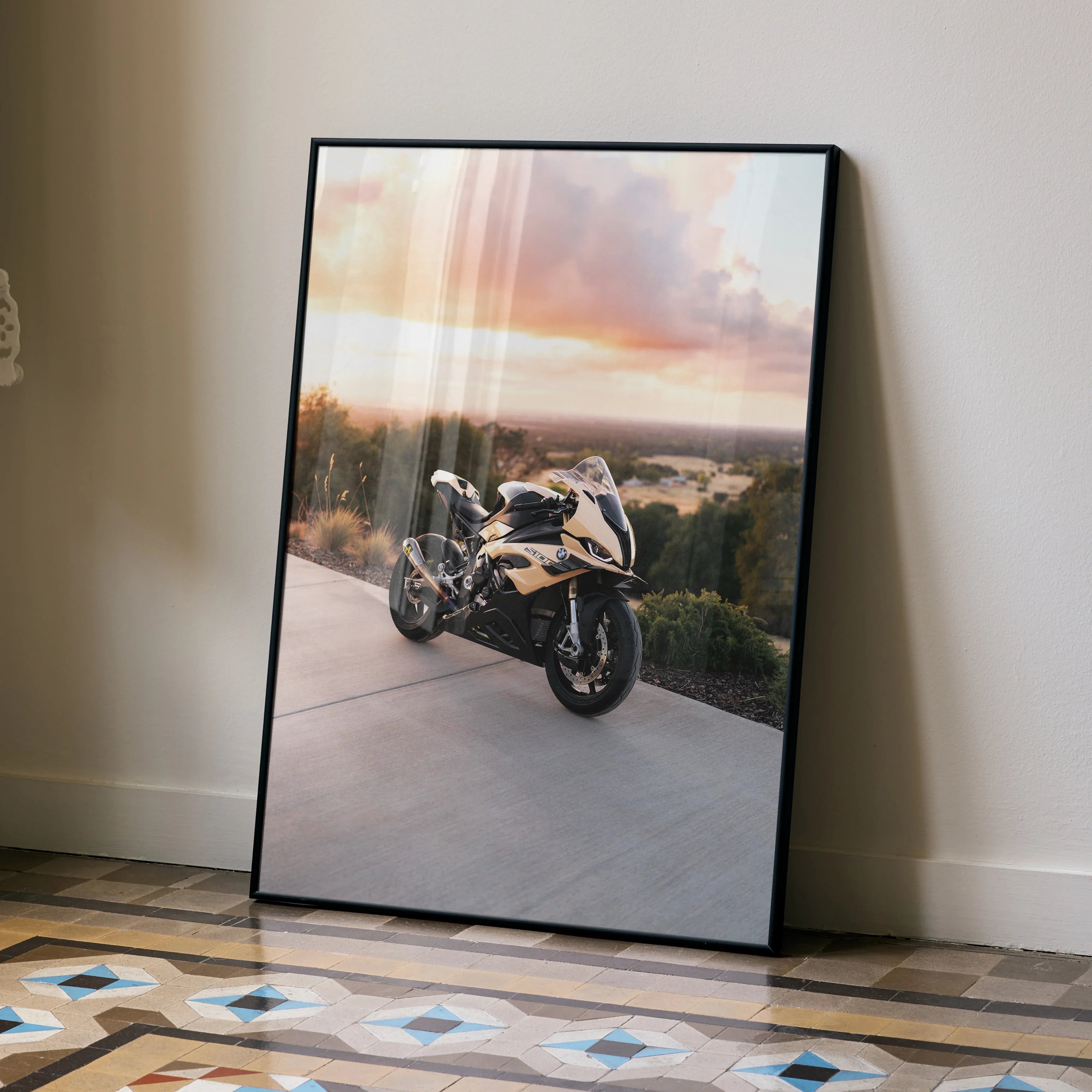 BMW S1000RR motorcycle poster with sunset background, modern wall art in black frame.