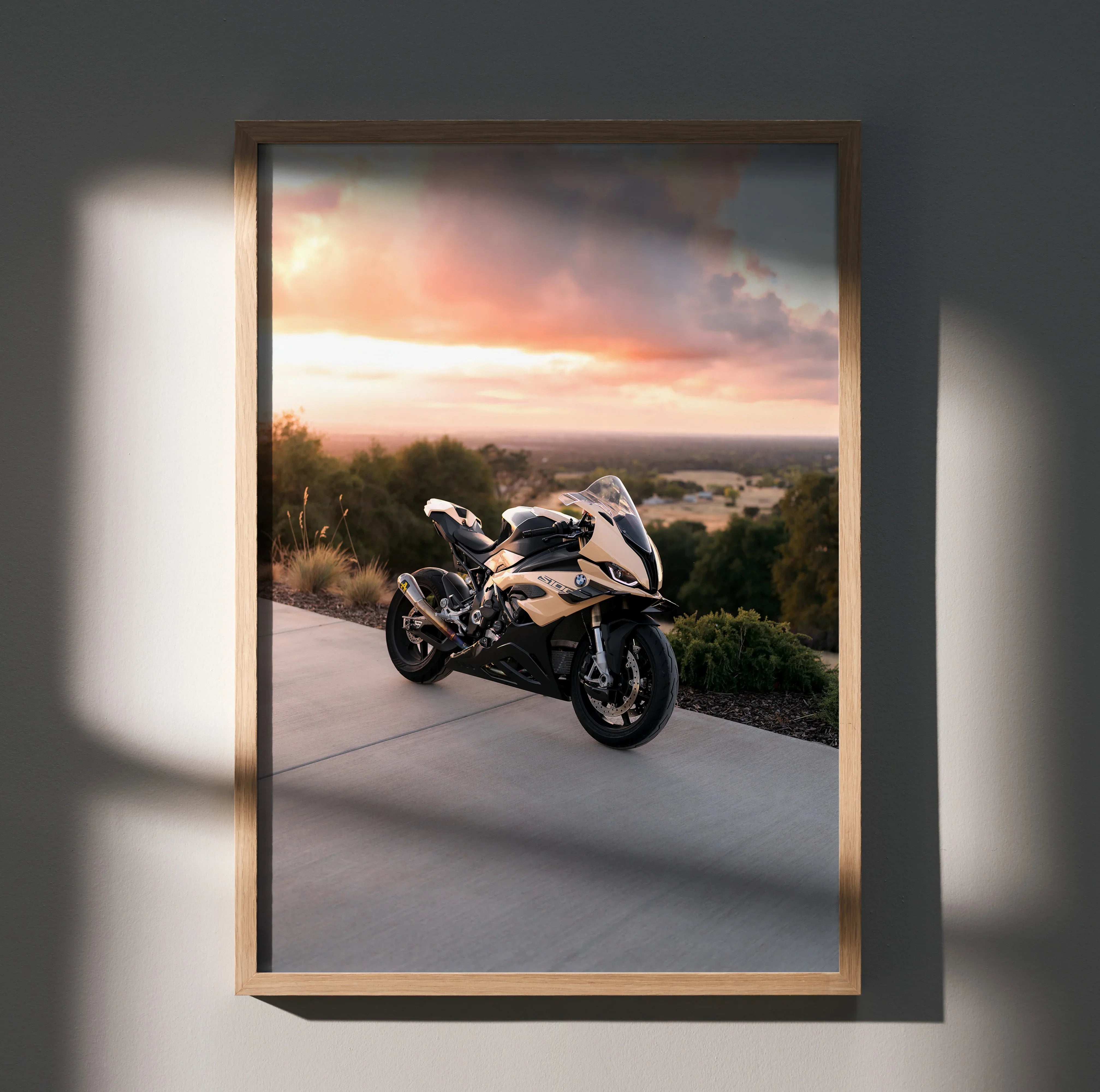 BMW S1000RR motorcycle poster with sunset background, modern wall art in wooden frame.