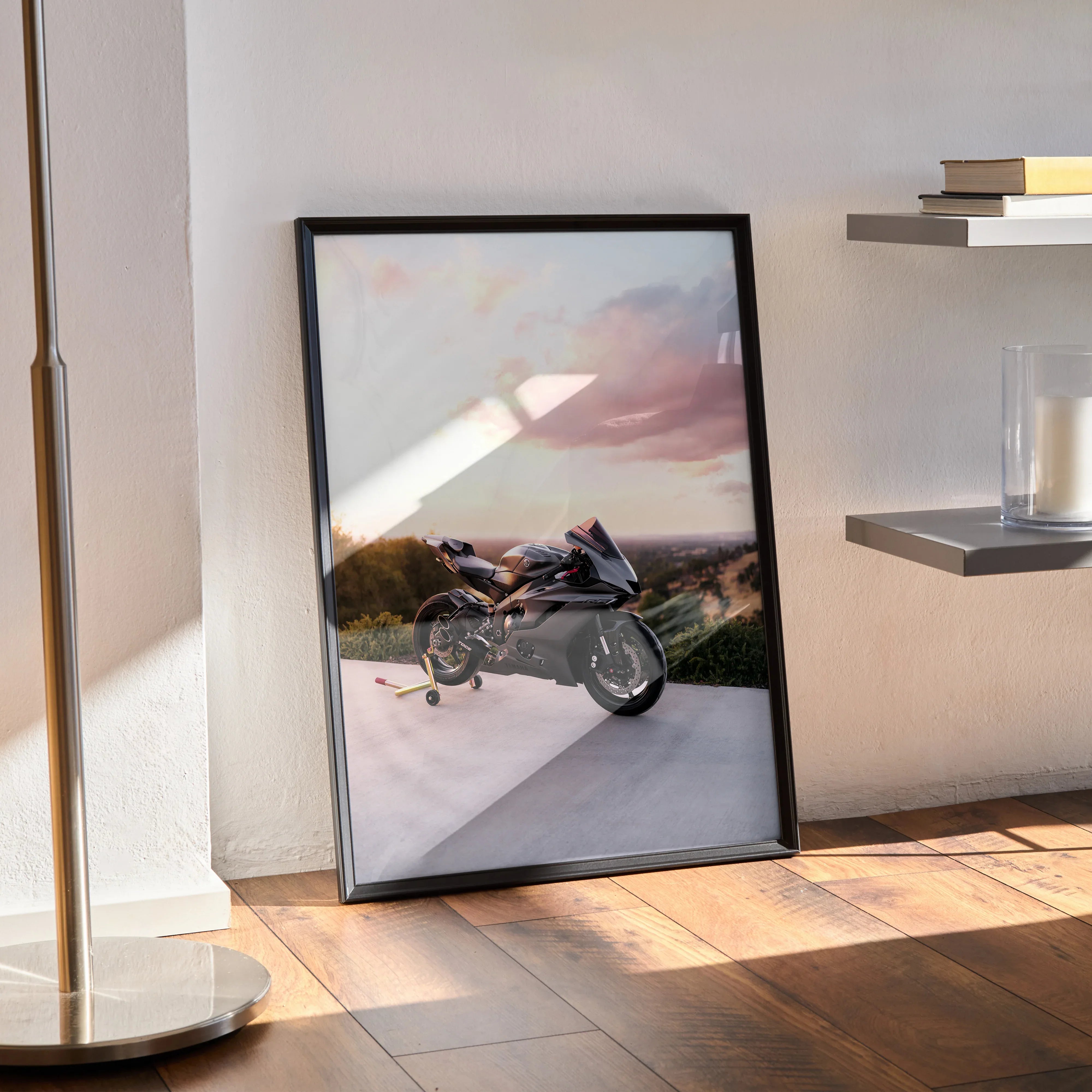 Yamaha R6 motorcycle poster wall art with sunset background leaning on wooden floor in modern room.