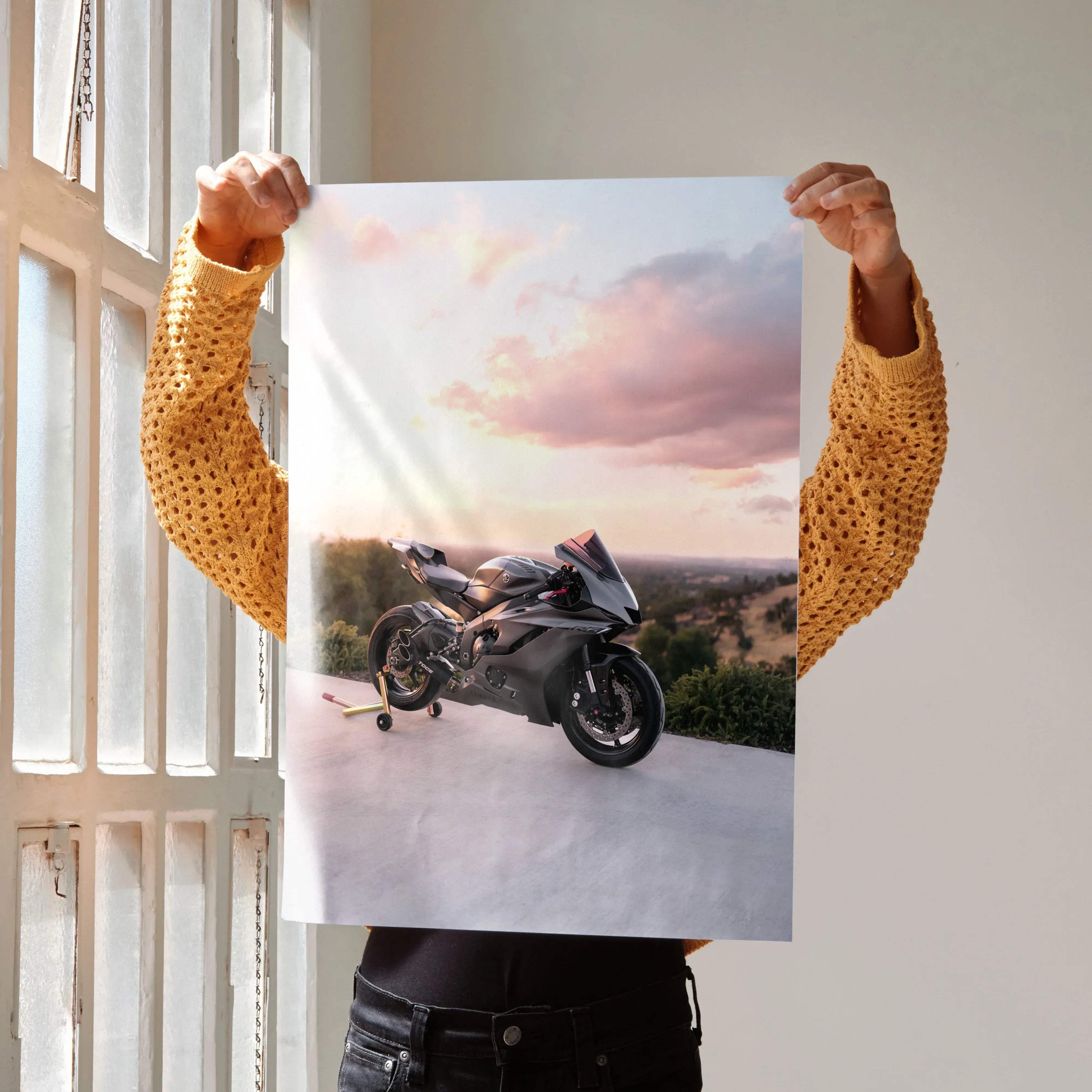 A sleek matte black and silver Yamaha R6 sport motorcycle poster with a high-performance bike at sunset