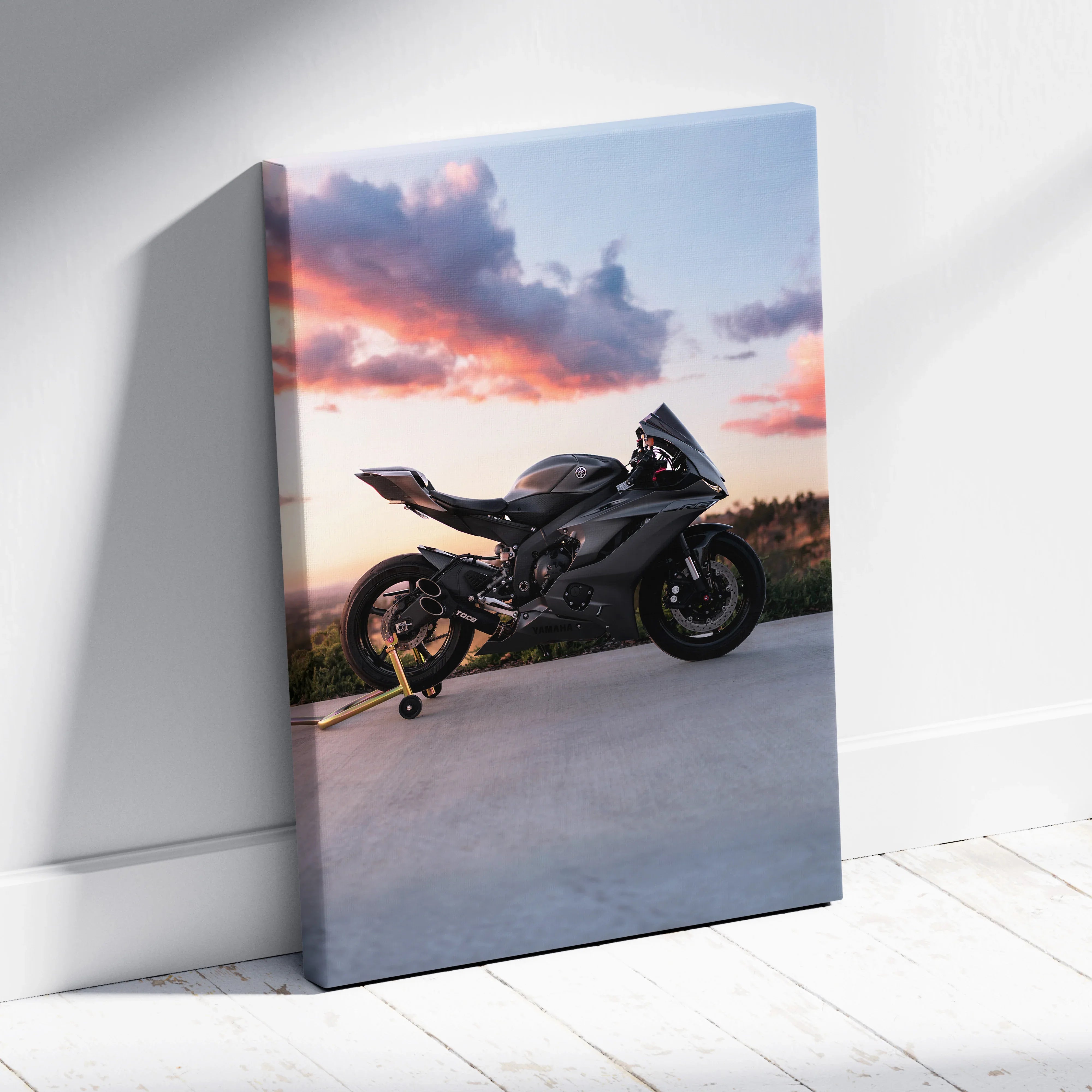 Black Yamaha R6 motorcycle against sunset sky on vertical canvas wall art.
