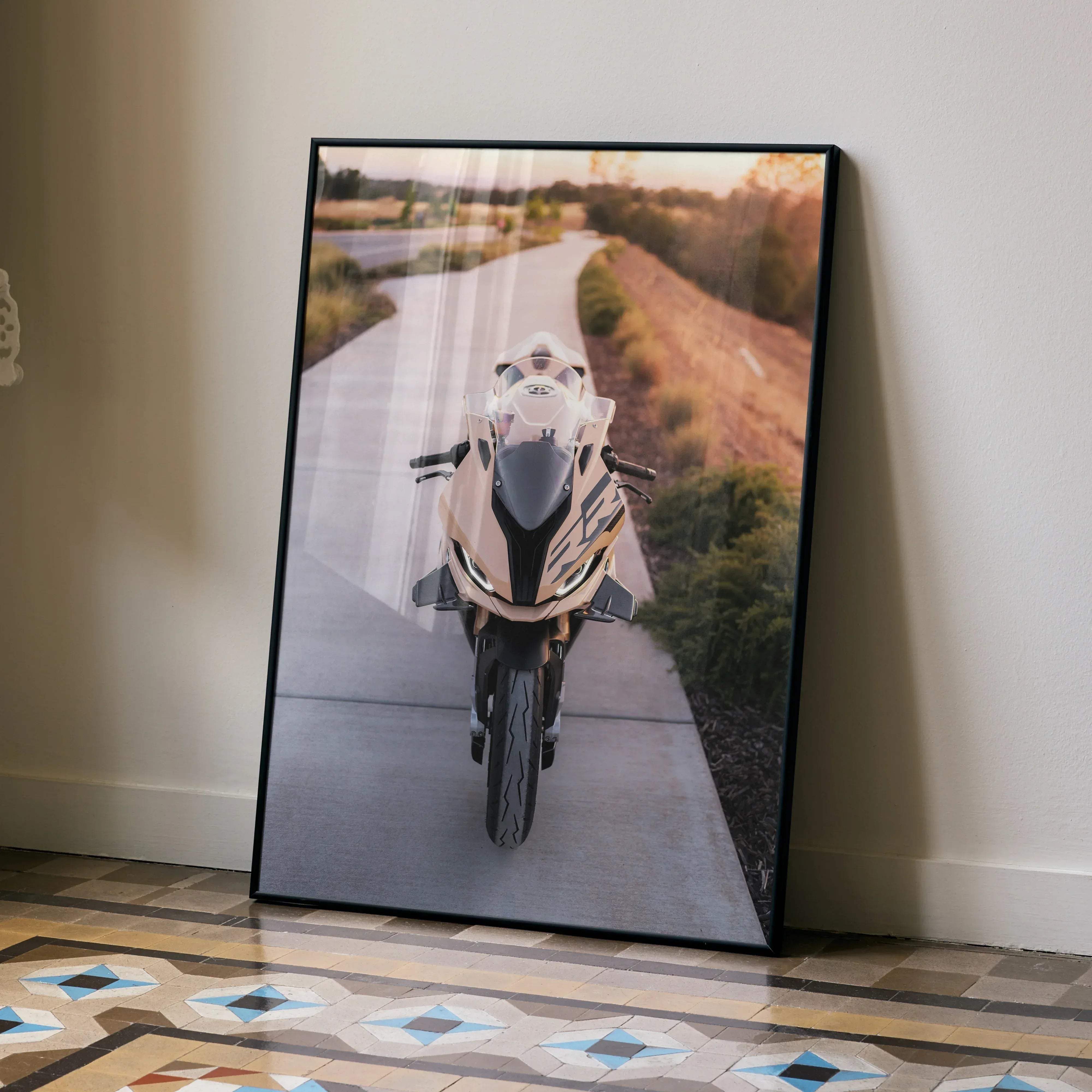 Black-framed BMW inspired S1000RR high resolution motorcycle poster featuring a white and gold bike on a sunlit road
