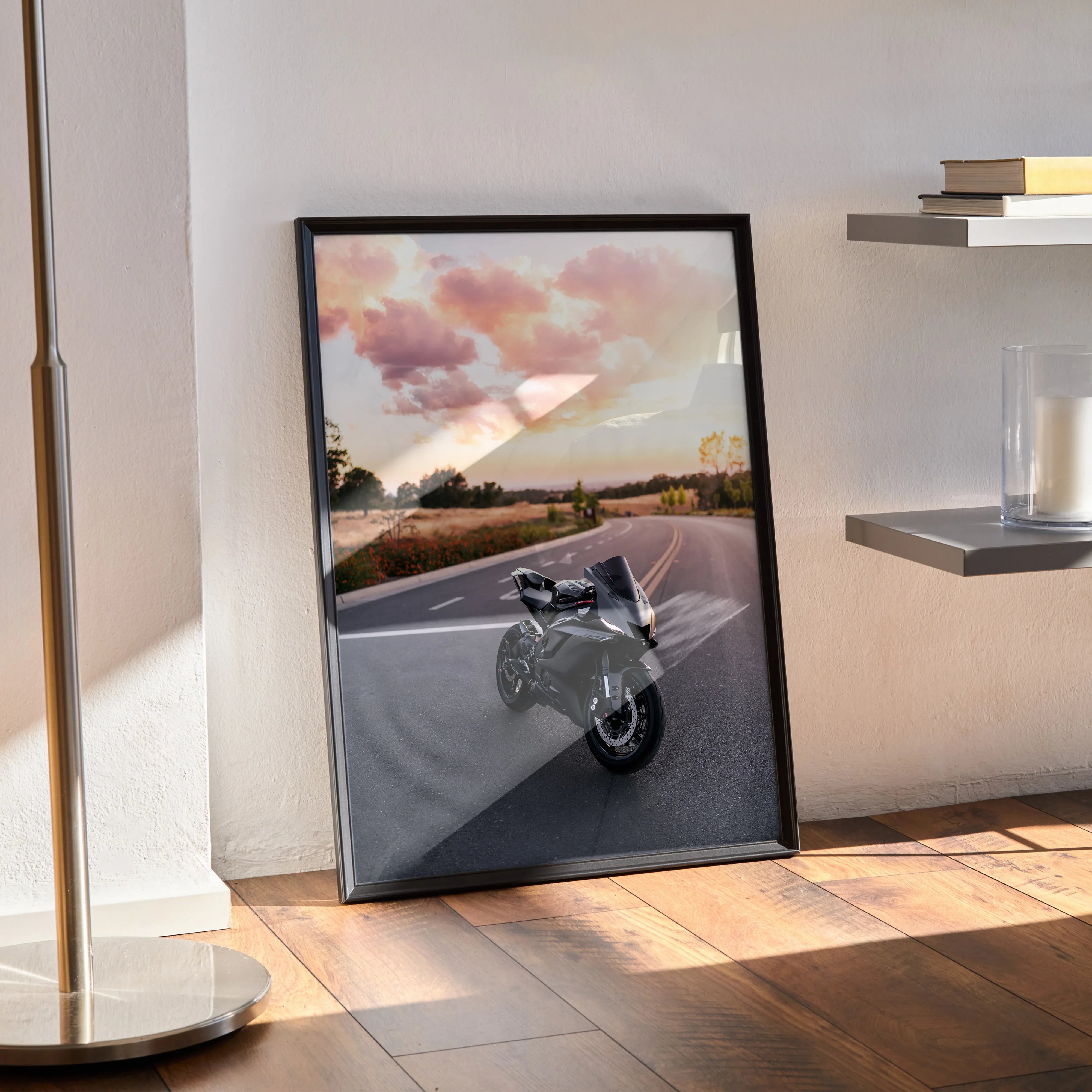 Yamaha R6 motorcycle poster leaning against wall with scenic road and sunset sky, framed wall art.