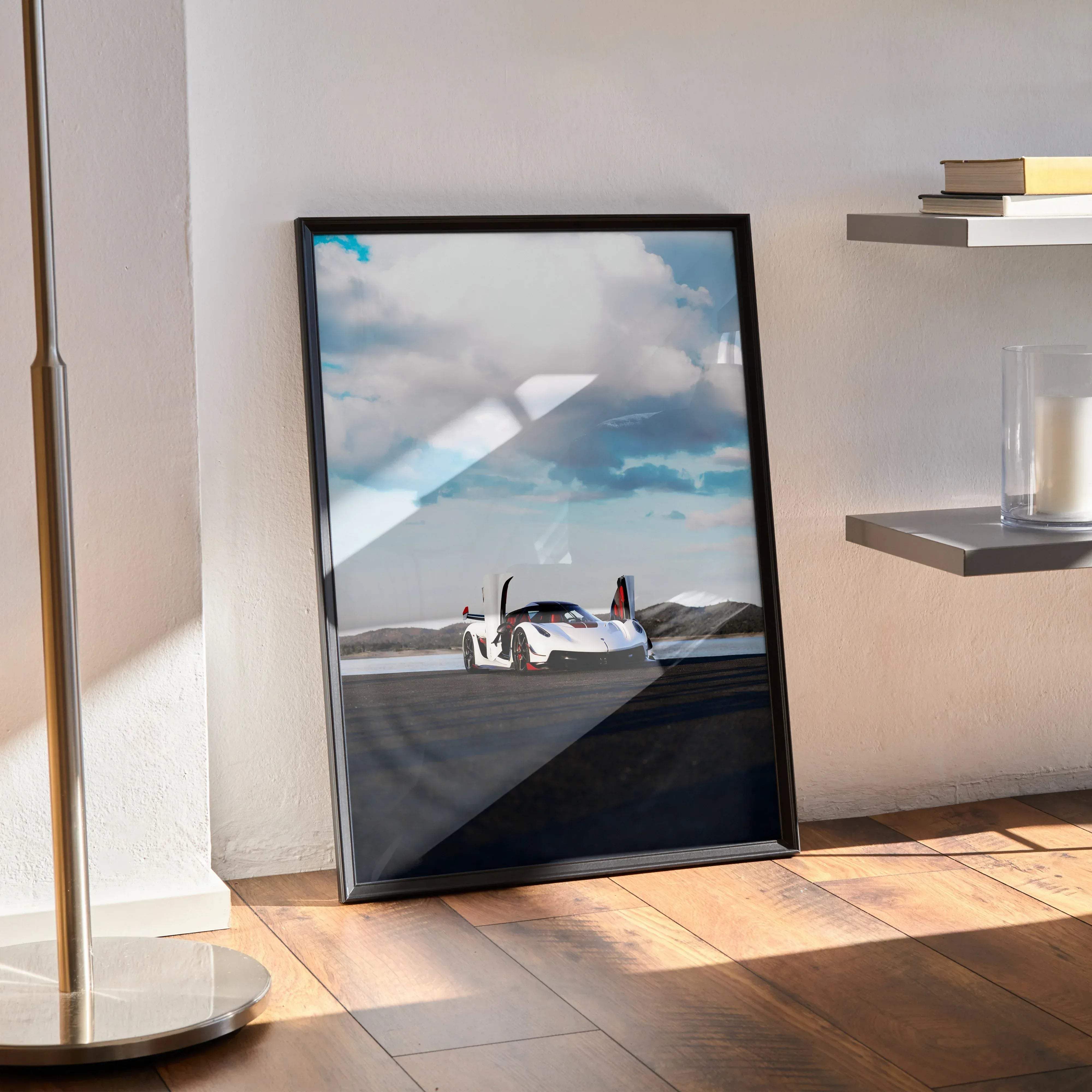 Black-framed koenigsegg jesko high resolution car poster featuring white sports car with red accents on racetrack