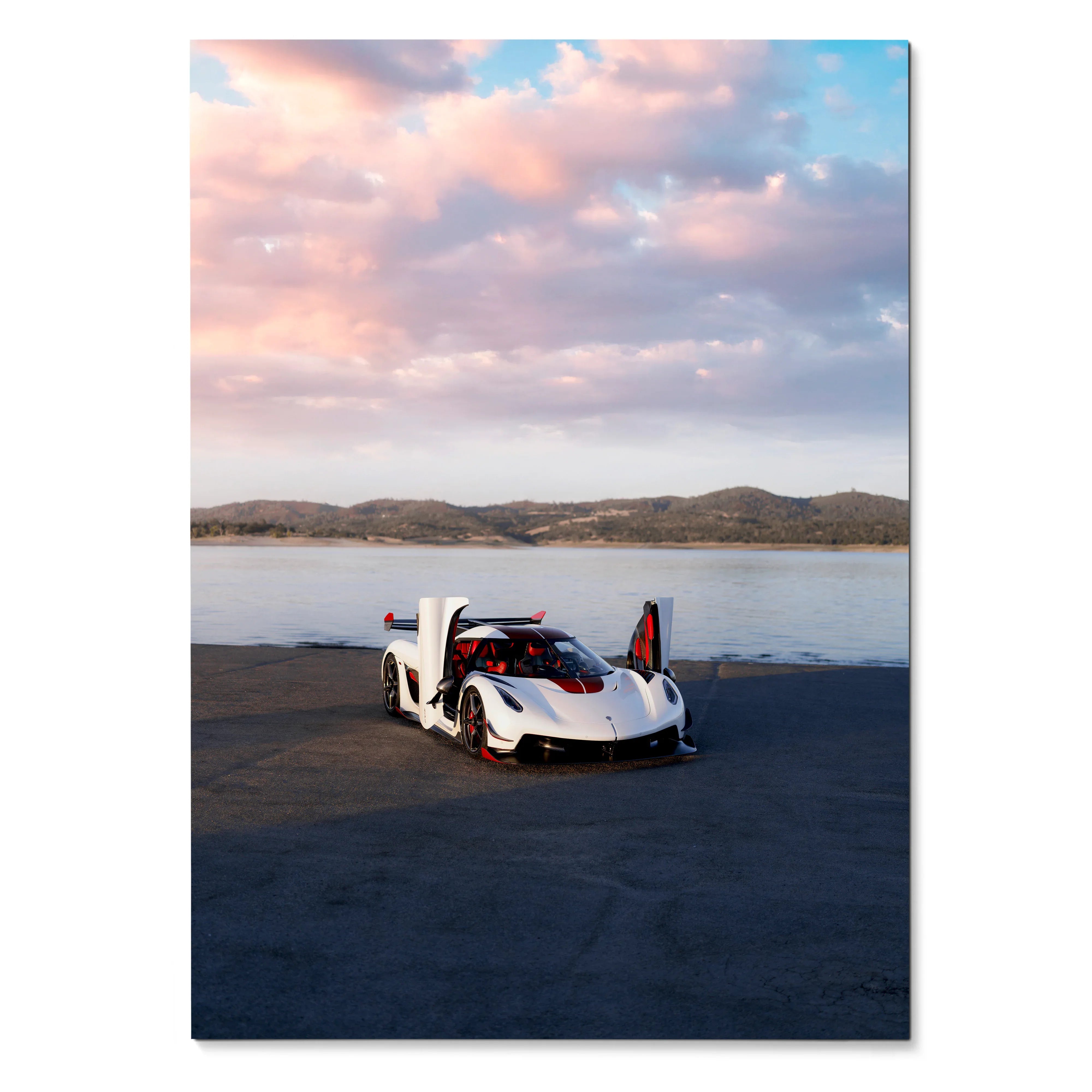 Koenigsegg Jesko sports car on asphalt with dramatic sunset sky poster wall art.