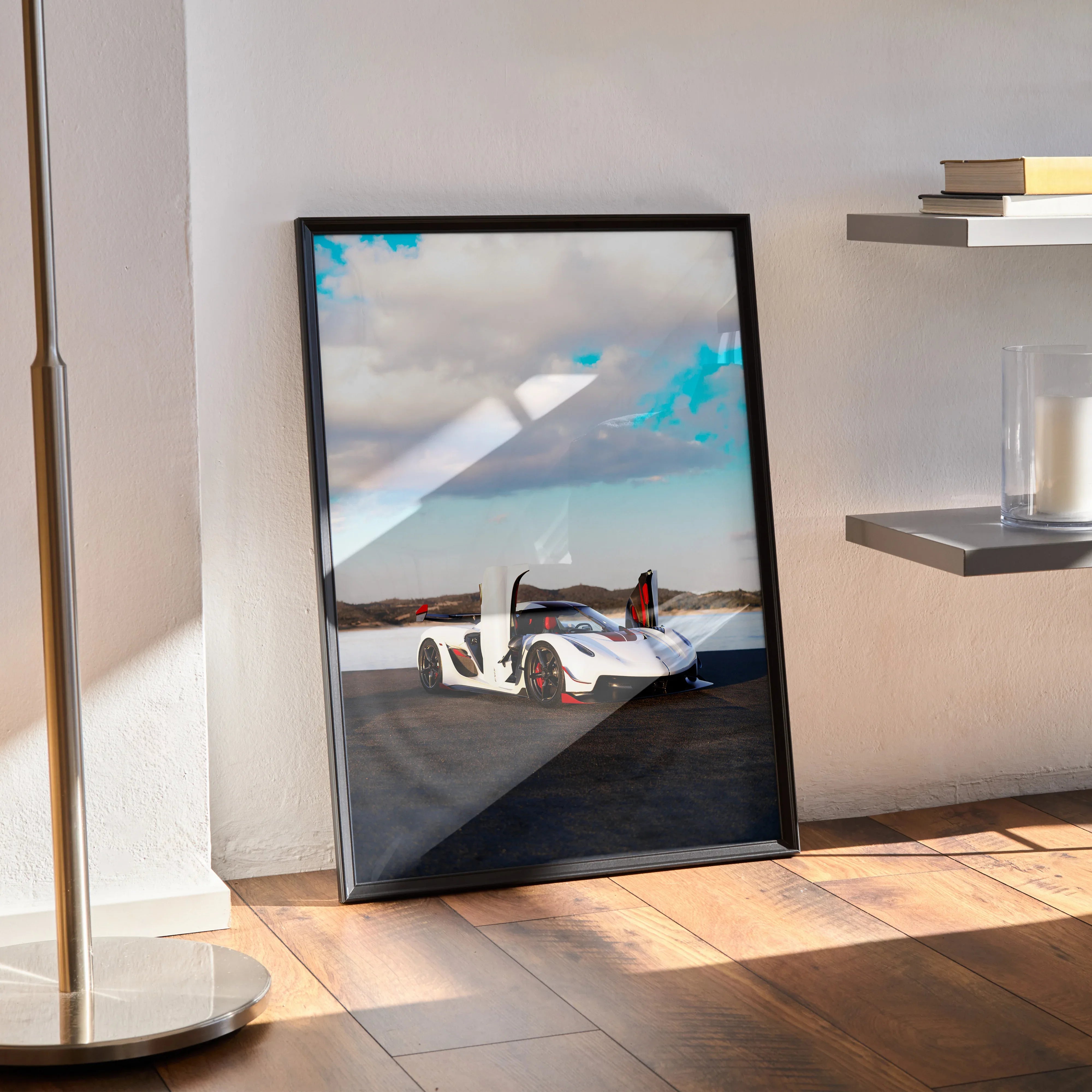 Koenigsegg Jesko car poster with white sports car and cloudy sky, wall art in black frame.