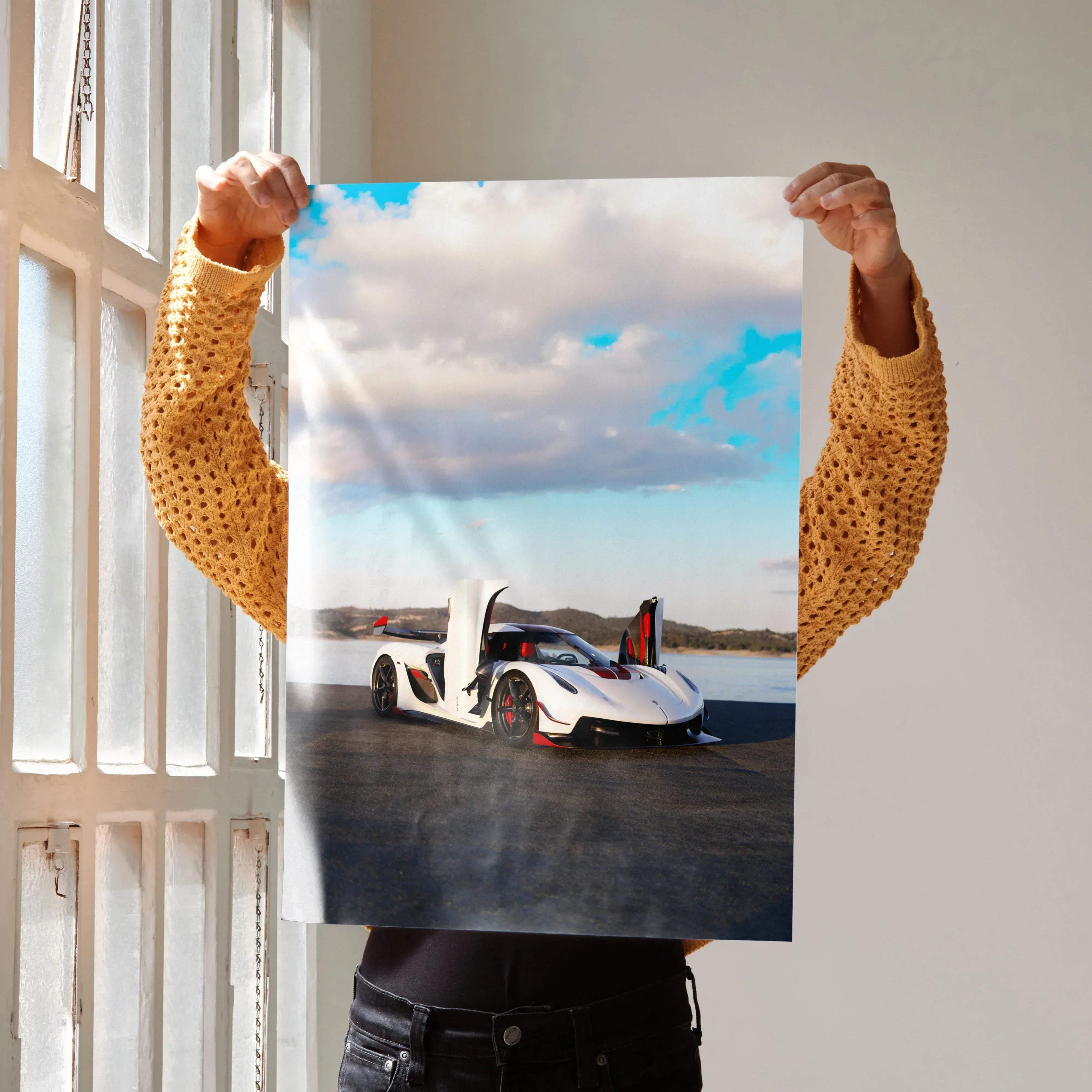 White koenigsegg jesko hypercar with red accents and black wheels on a high resolution printed car poster