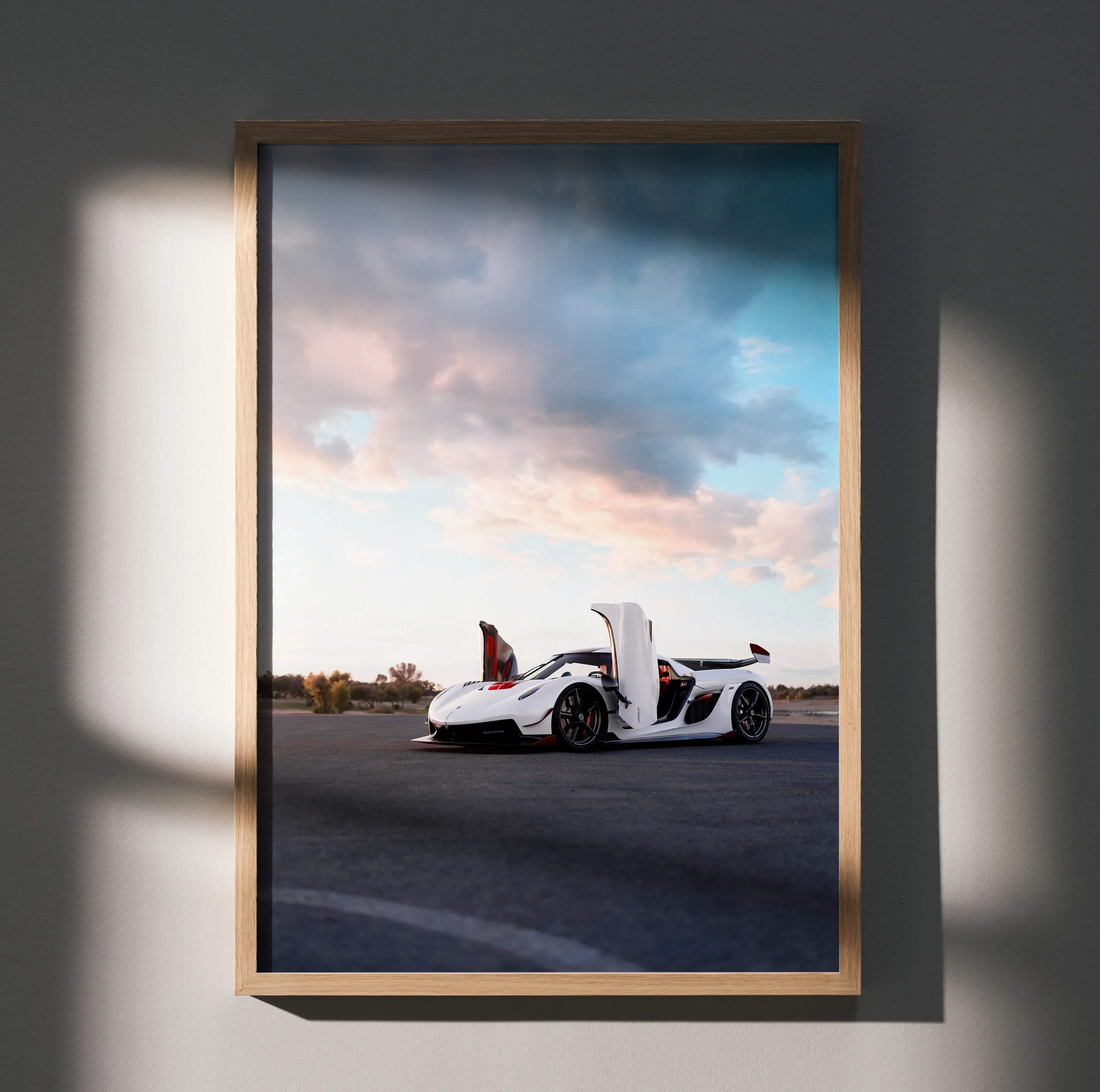 White koenigsegg jesko hypercar with gull-wing doors open framed in light wood high resolution car poster