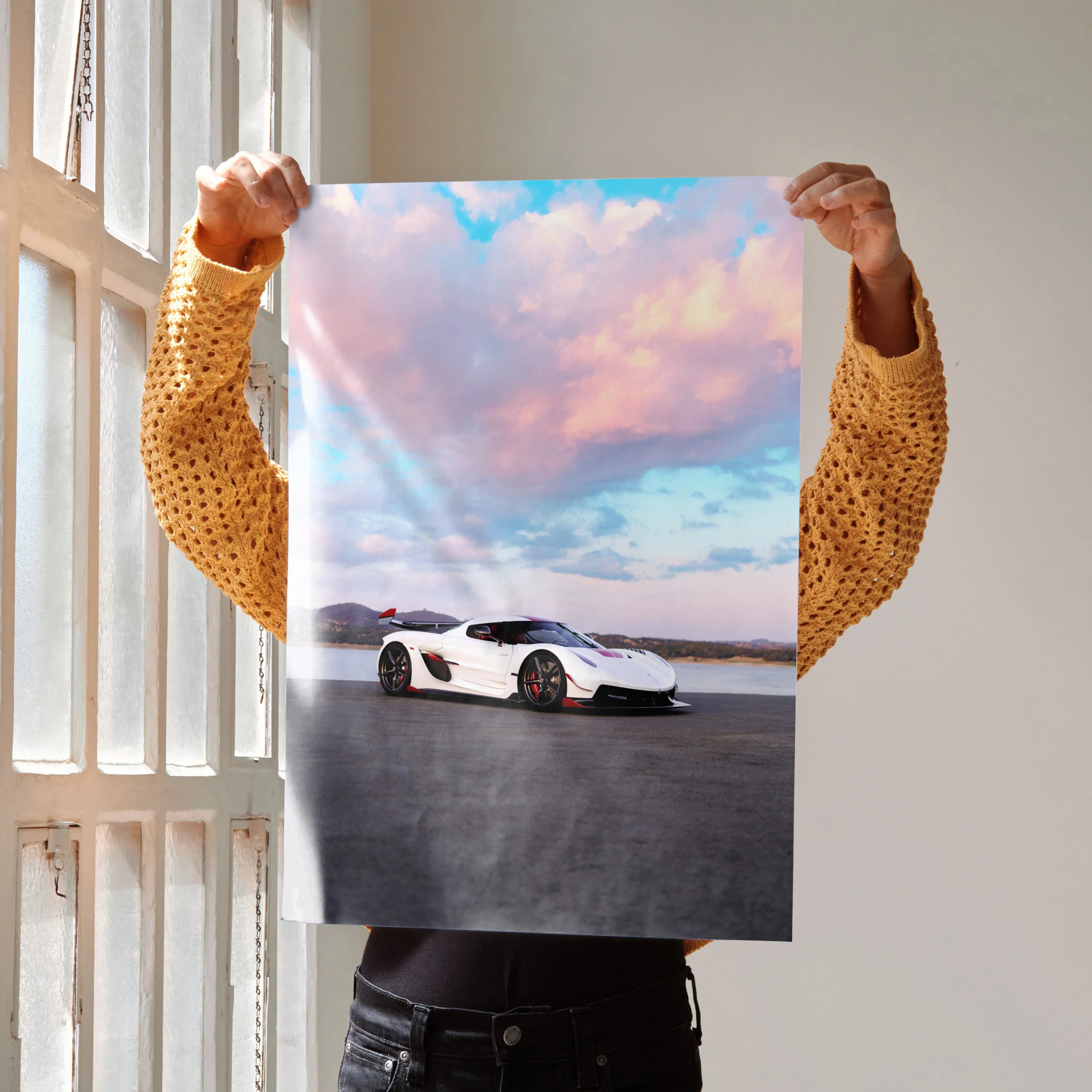 Koenigsegg Jesko supercar on open road with vibrant sunset sky poster wall art.