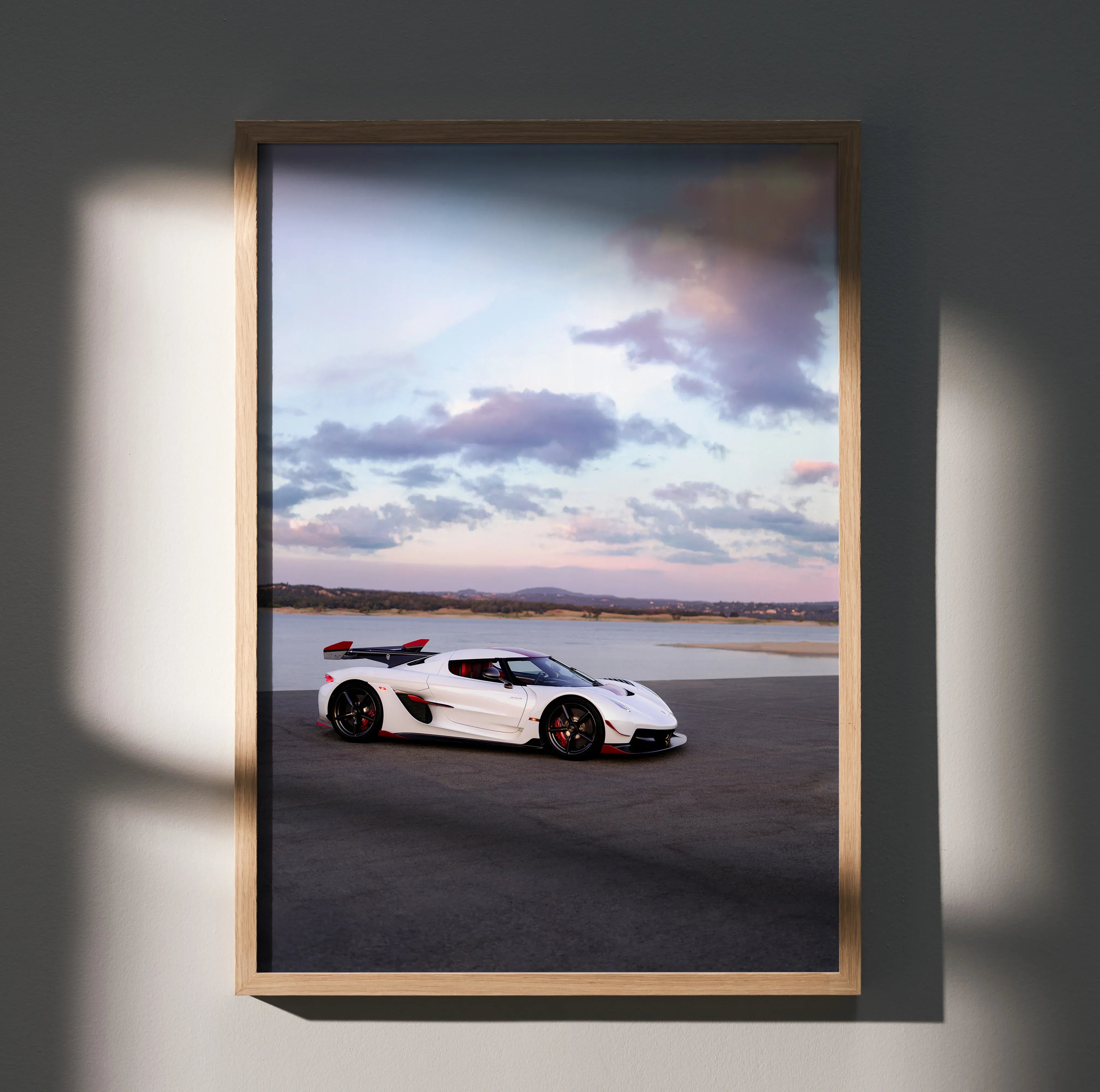 Koenigsegg Jesko white sports car poster with dramatic sky backdrop wall art.