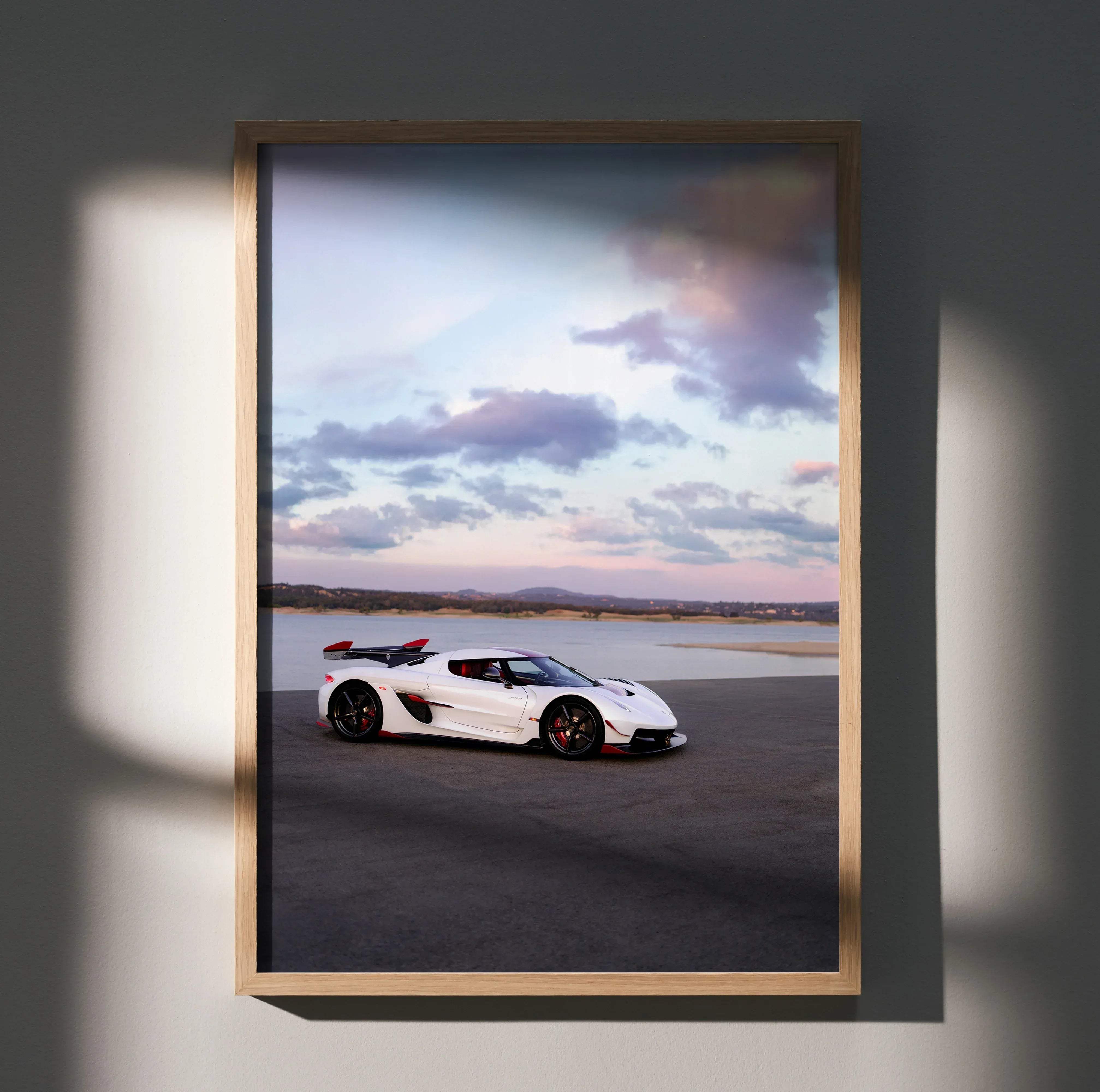 Koenigsegg jesko high resolution car poster featuring white and red hypercar in a light wood frame