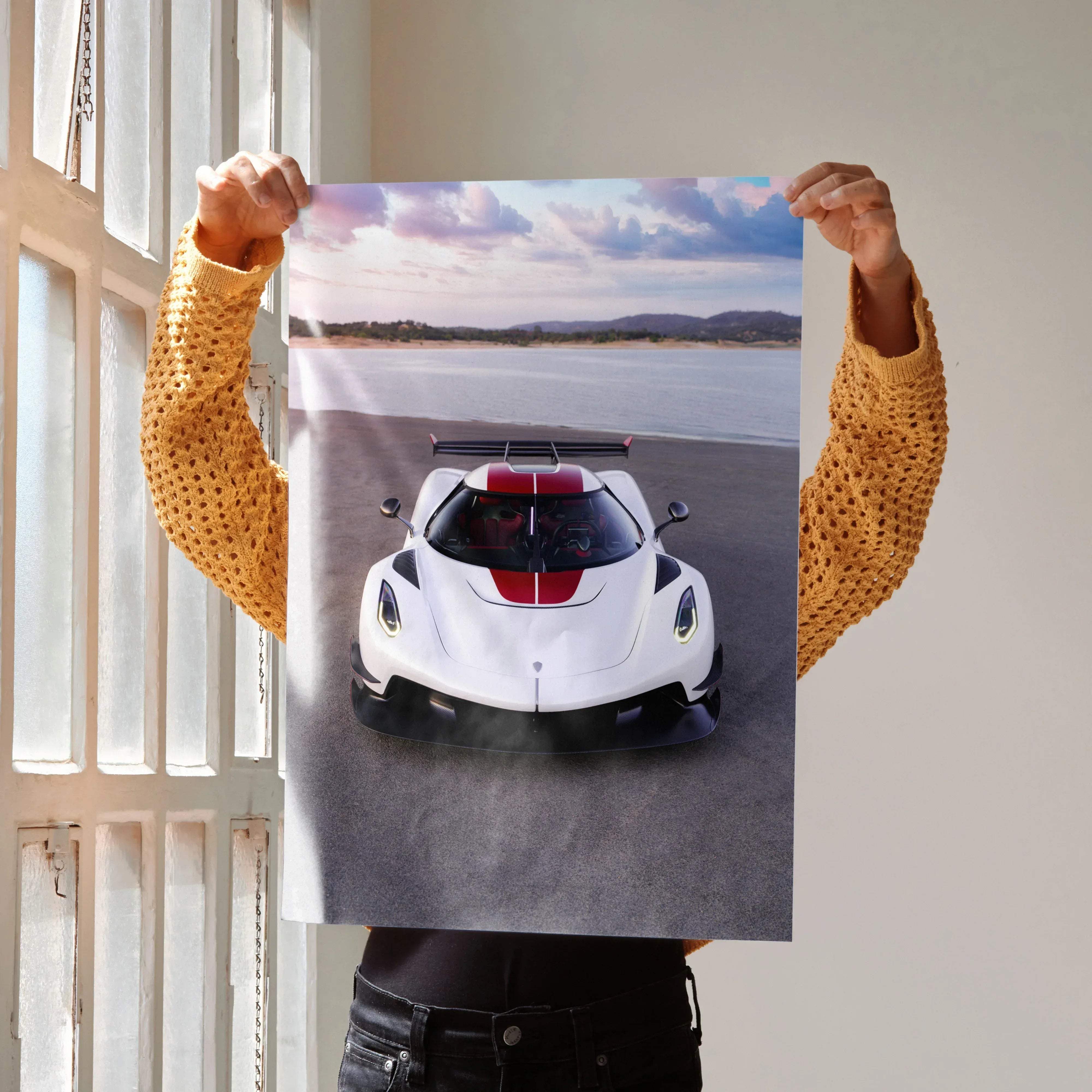 A white and red koenigsegg jesko hypercar poster with sleek design prominent headlights and rear spoiler for wall decor