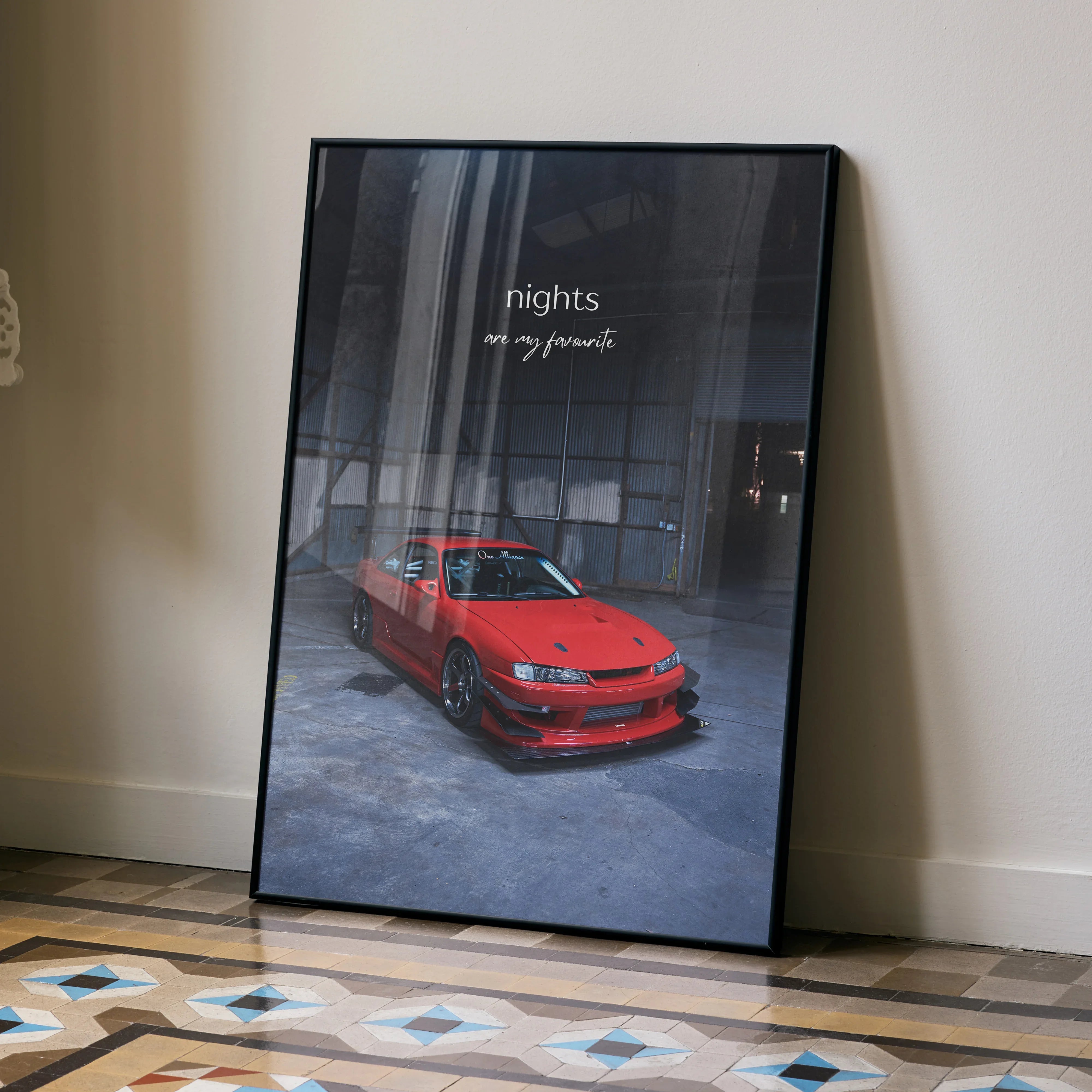 Motivational poster wall art featuring red Nissan 240sx S14 Kouki in dimly lit urban setting with inspiring text.