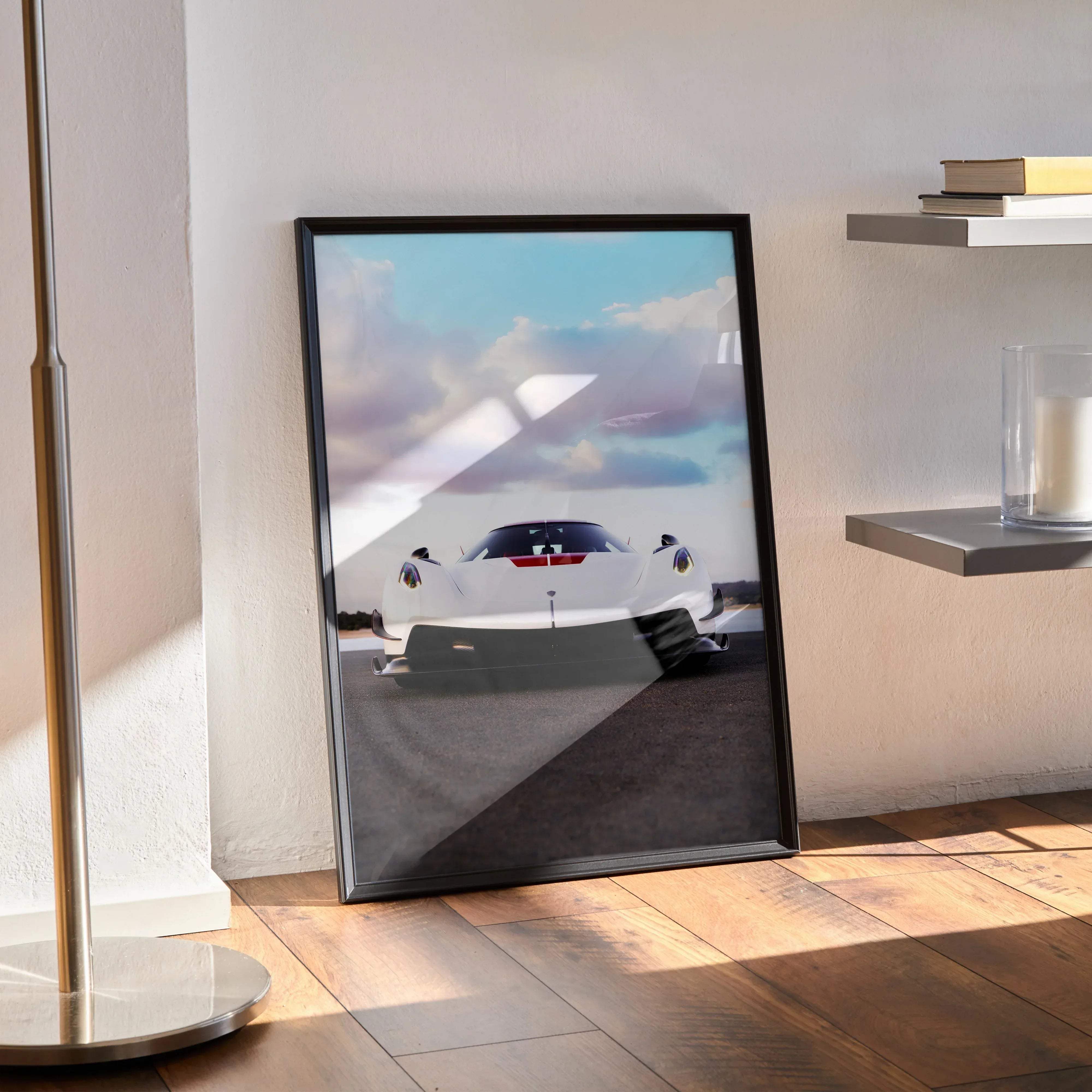 Black-framed poster of a white koenigsegg jesko sports car with red accents under a cloudy sky high resolution
