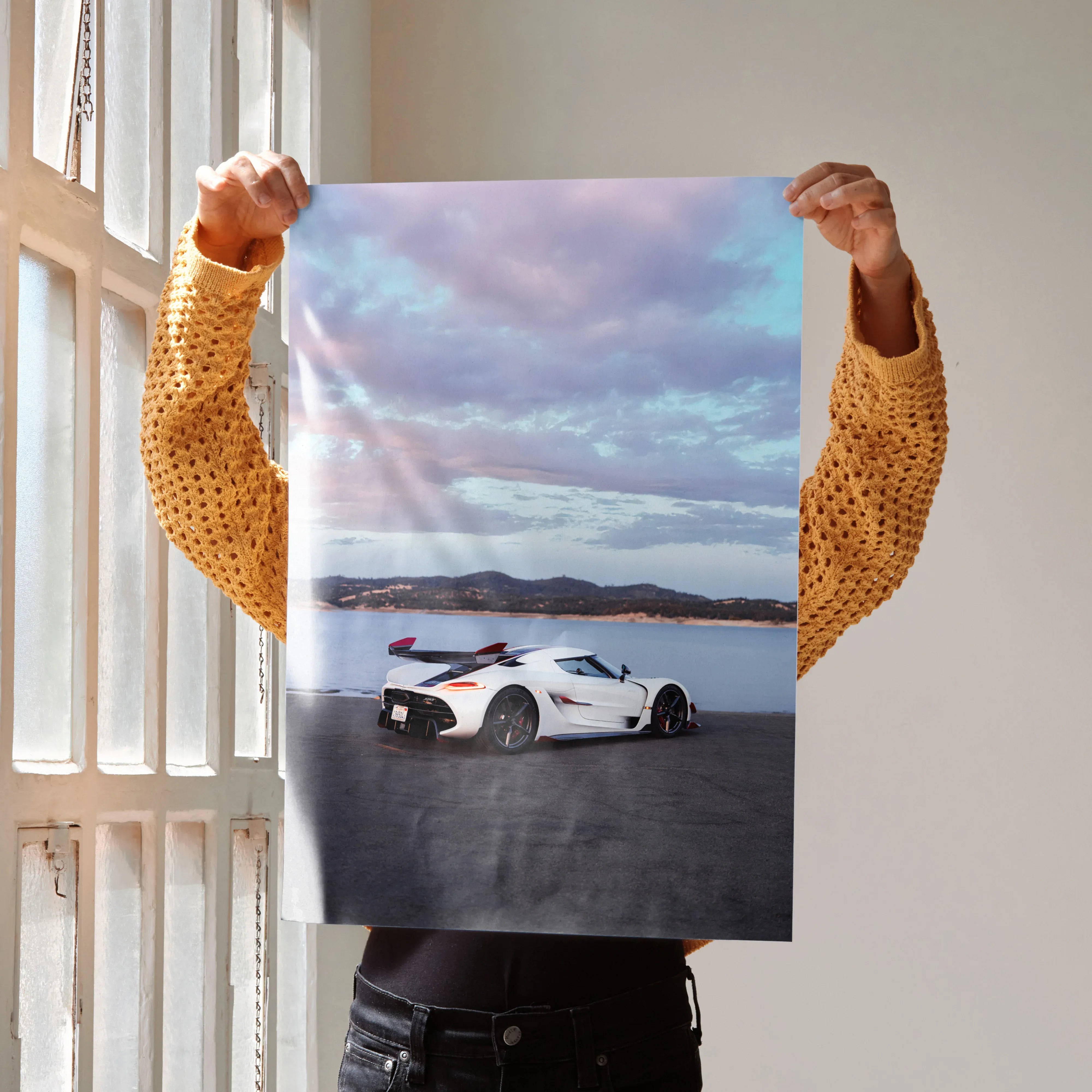 Koenigsegg Jesko sports car poster with scenic mountain and sky background wall art.