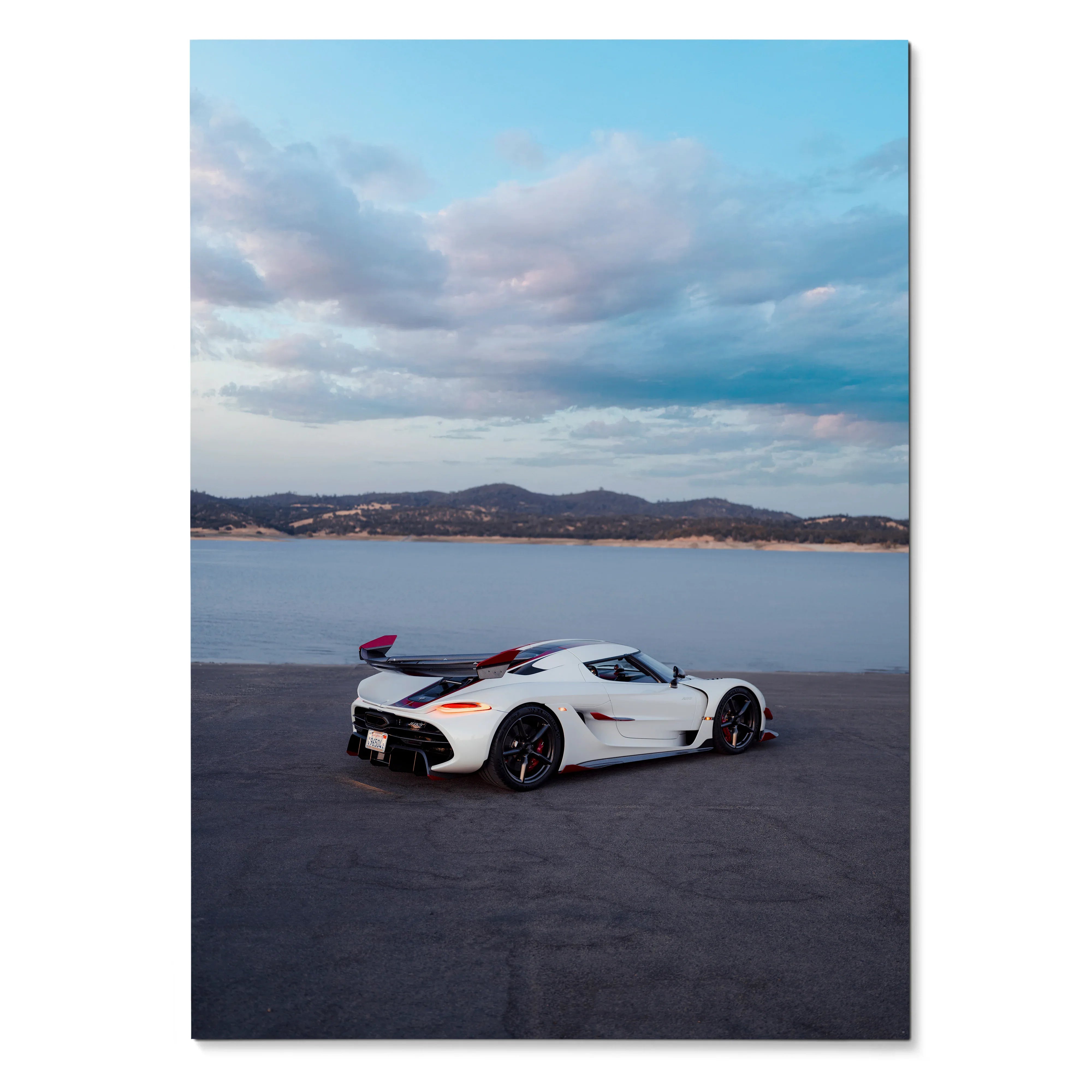 Koenigsegg Jesko white sports car on asphalt with lake and mountains background wall art poster.