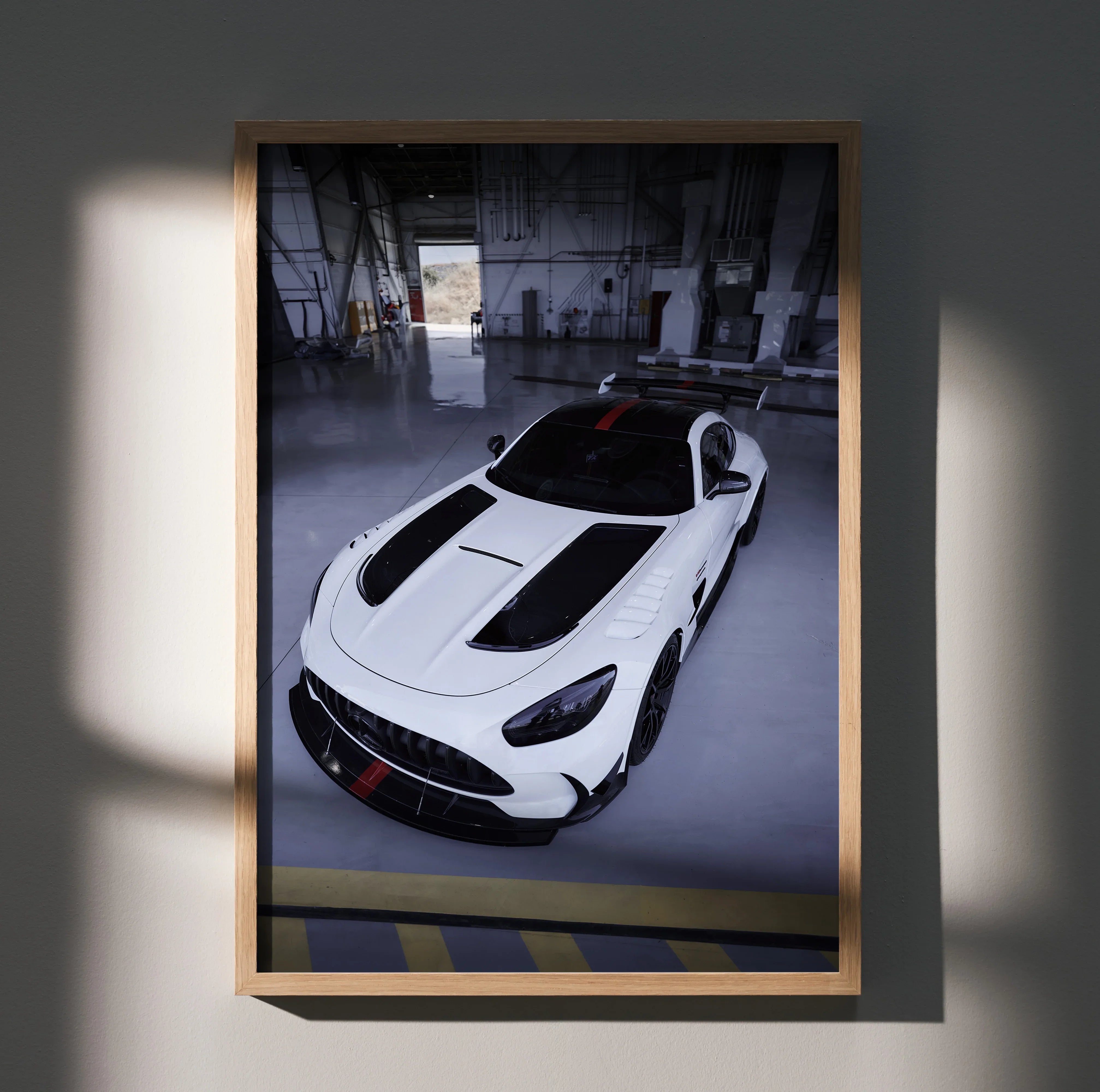 Mercedes AMG GT Black Series white sports car wall art poster in a wooden frame.