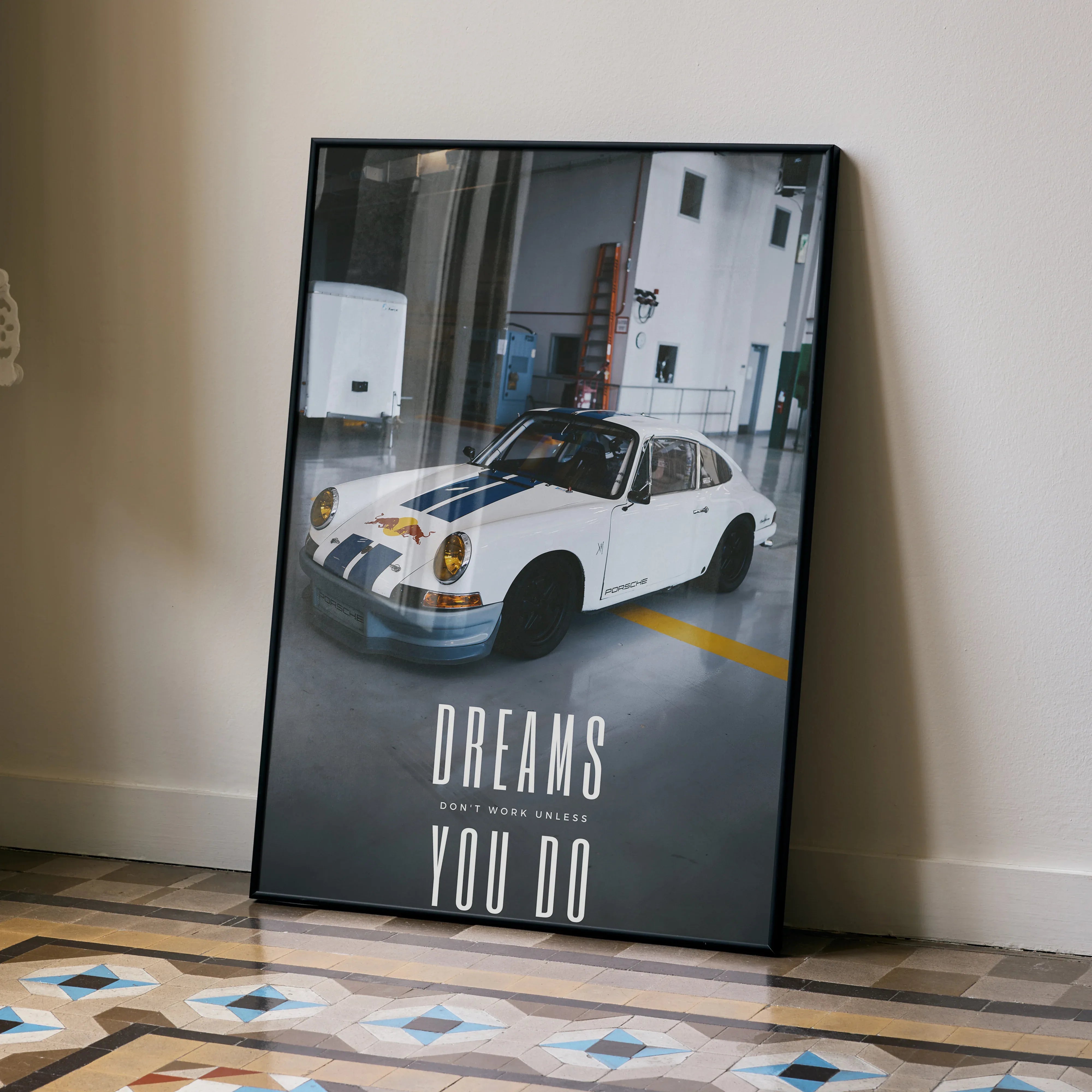 Motivational poster wall art featuring a white classic Porsche 911 with inspiring text on a dark background.