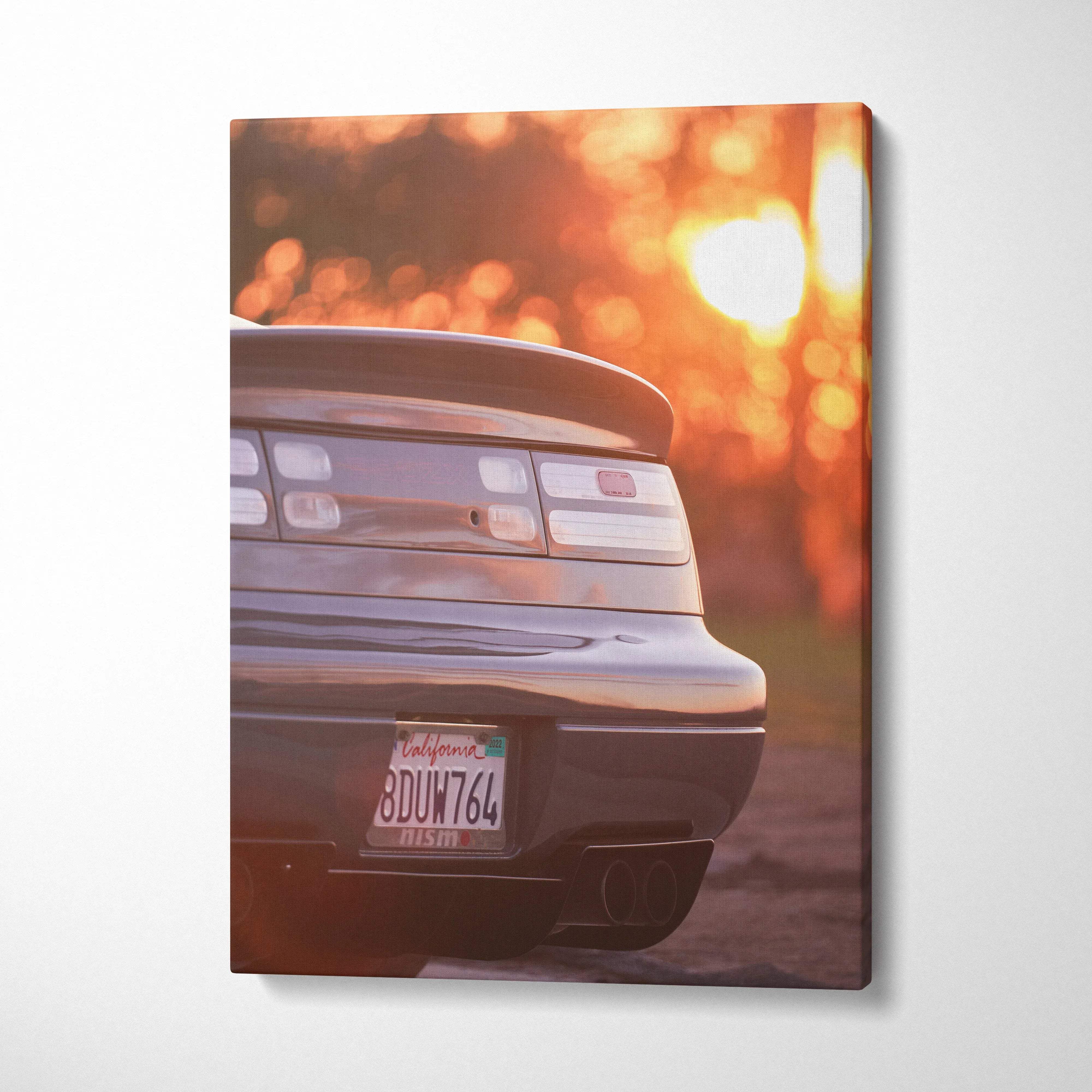 Nissan 300zx rear view at sunset on vertical canvas wall art with warm orange tones.